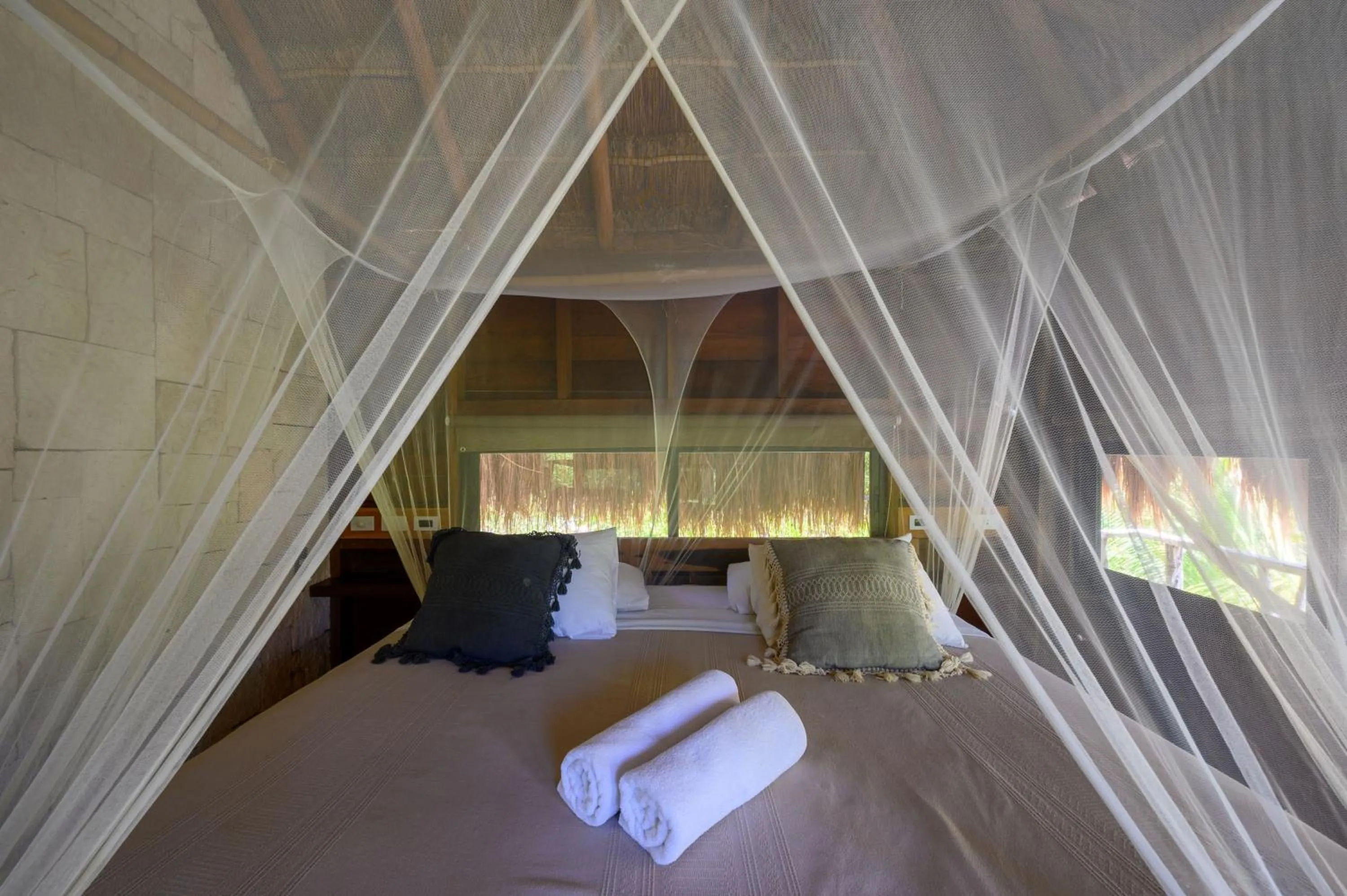 Bed in Vida Silvestre Tulum