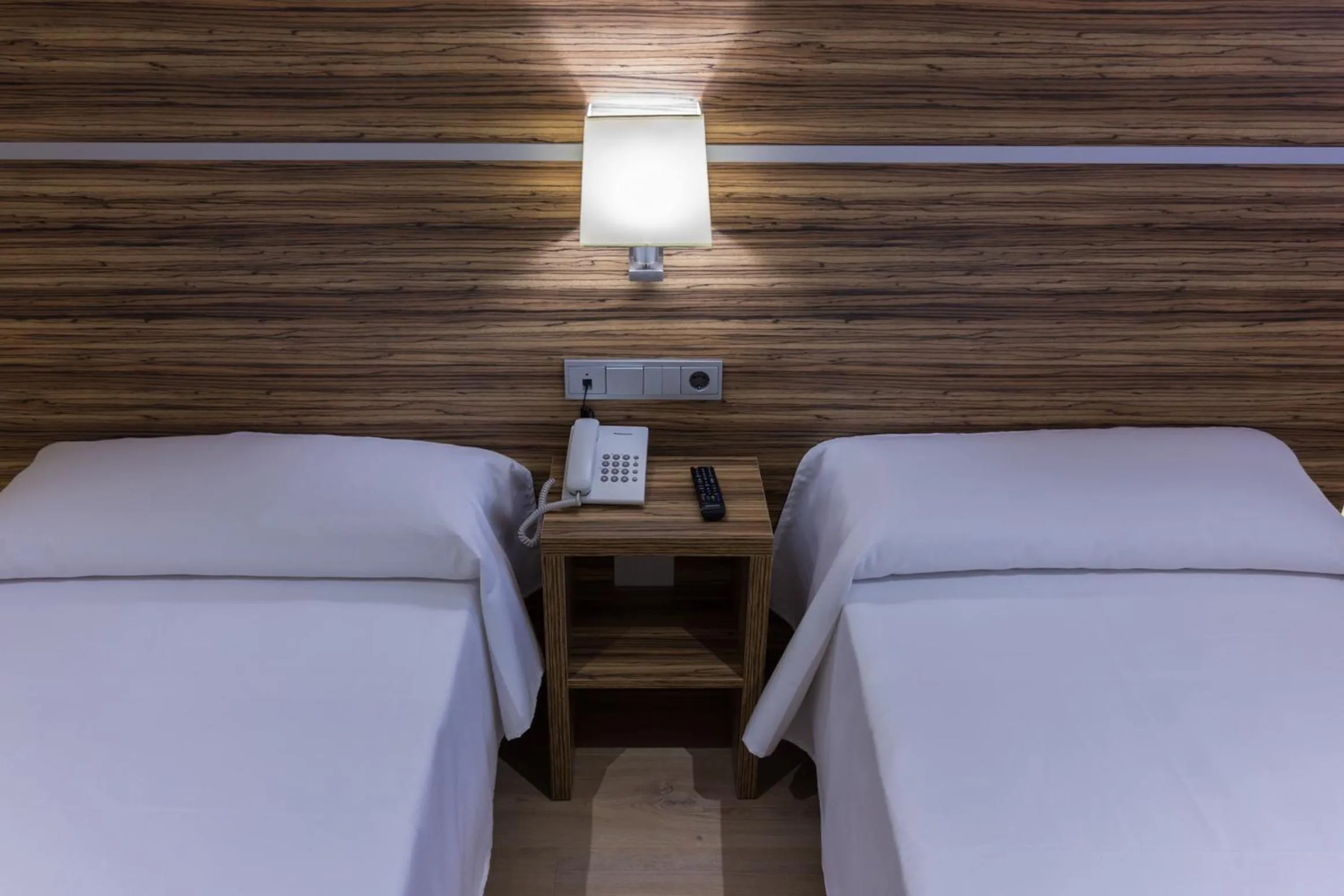 Bed in Hotel Novo Cándido