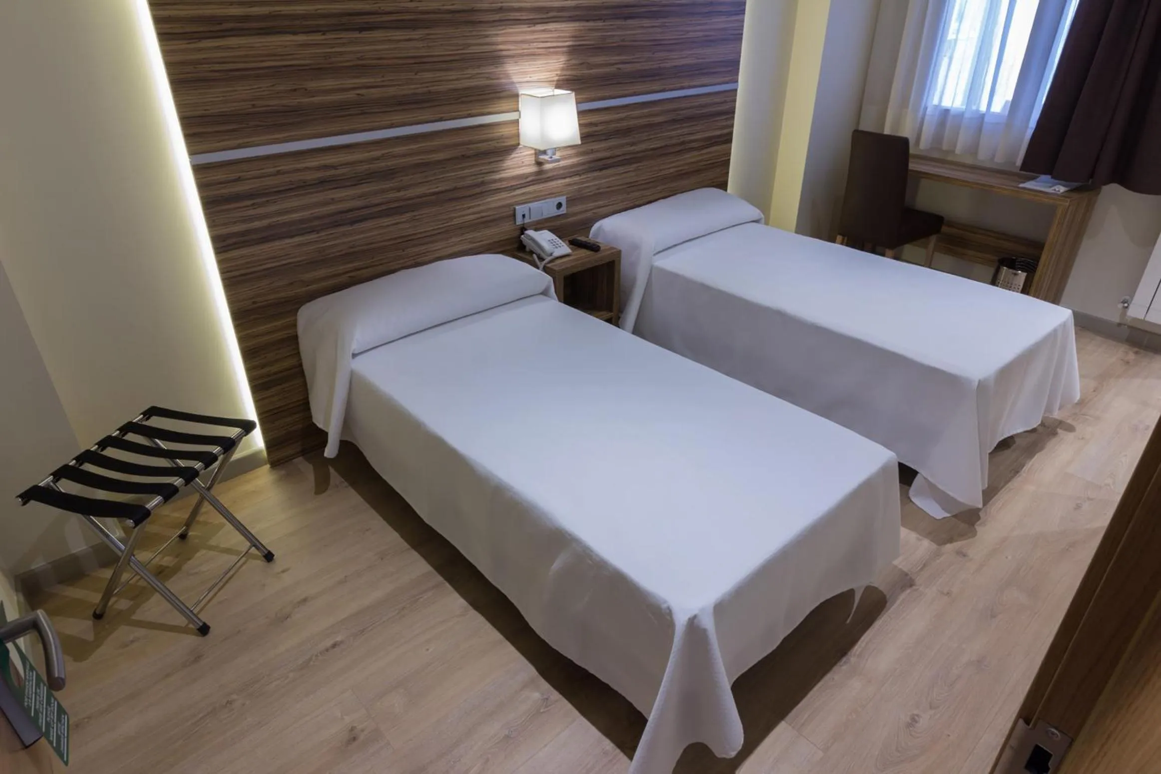 Bed in Hotel Novo Cándido