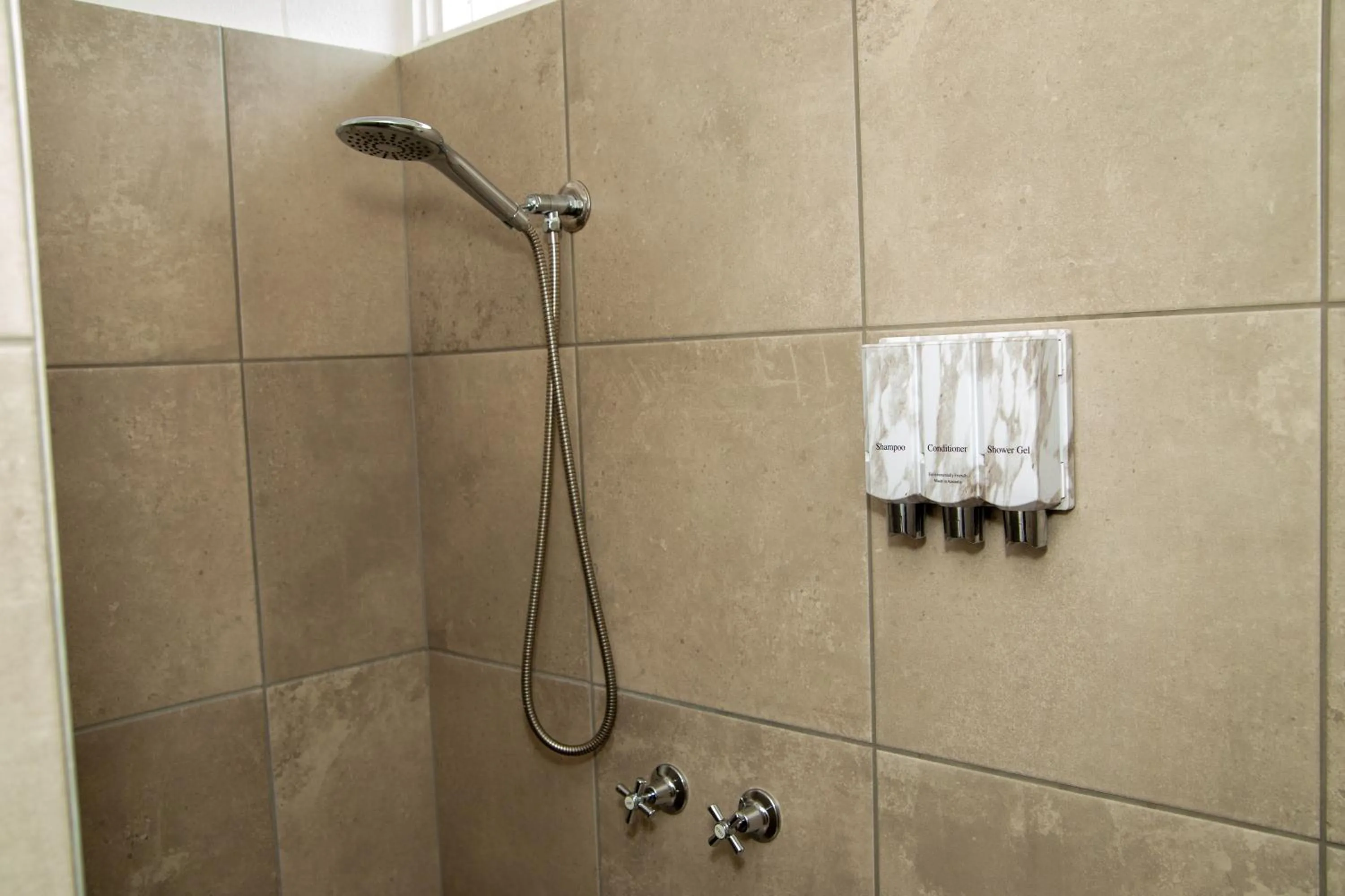 Shower in Ocean Views Motel Lakes Entrance