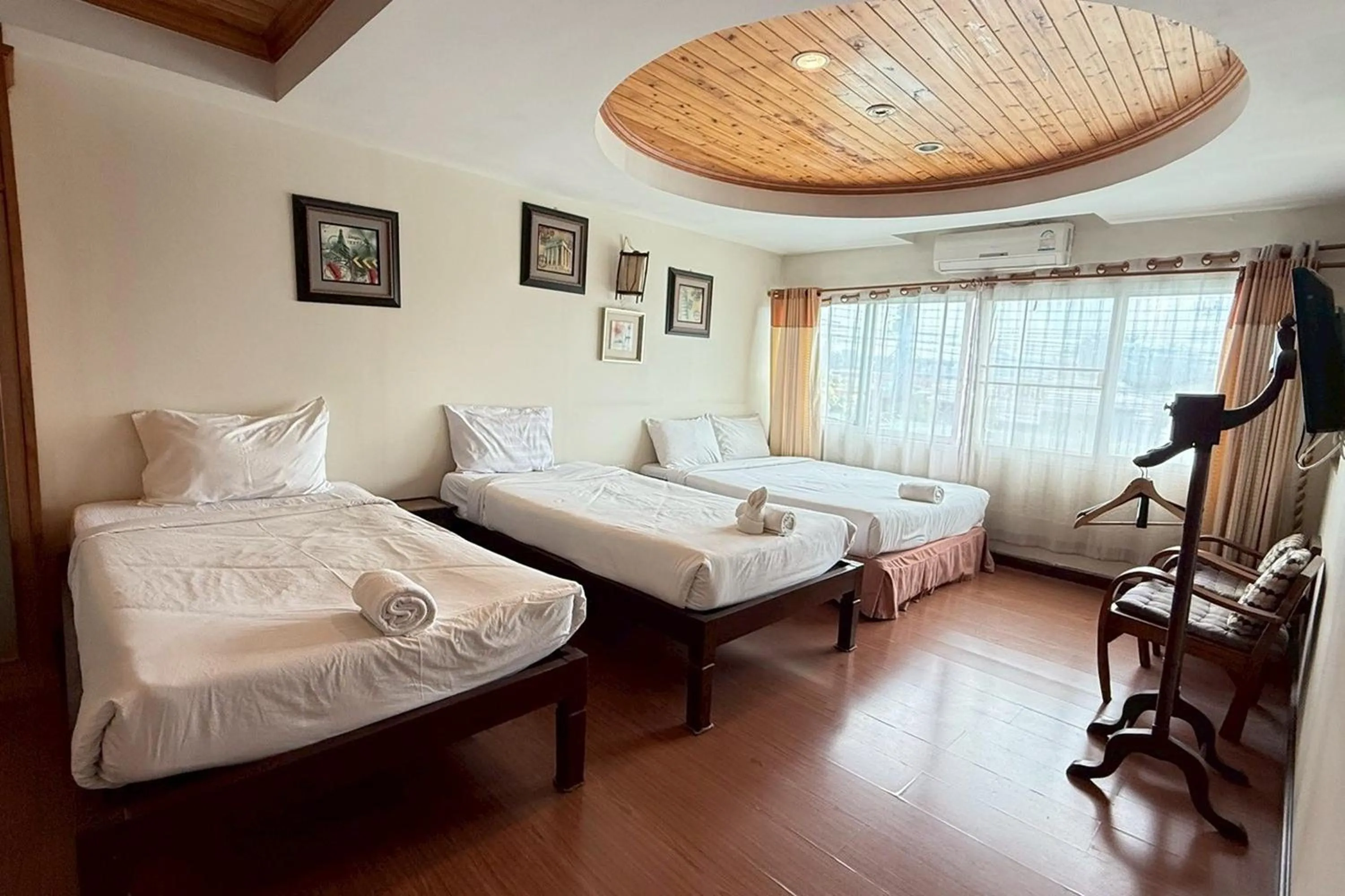 Photo of the whole room, Bed in Maekhong Delta Boutique Hotel