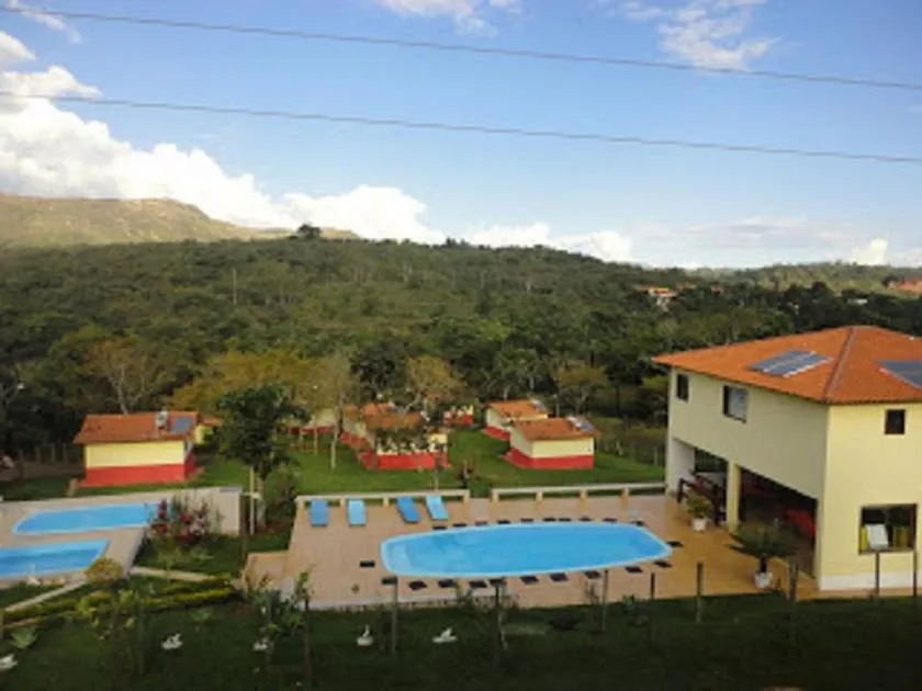 Swimming pool in Chalés Colina de Casa Branca