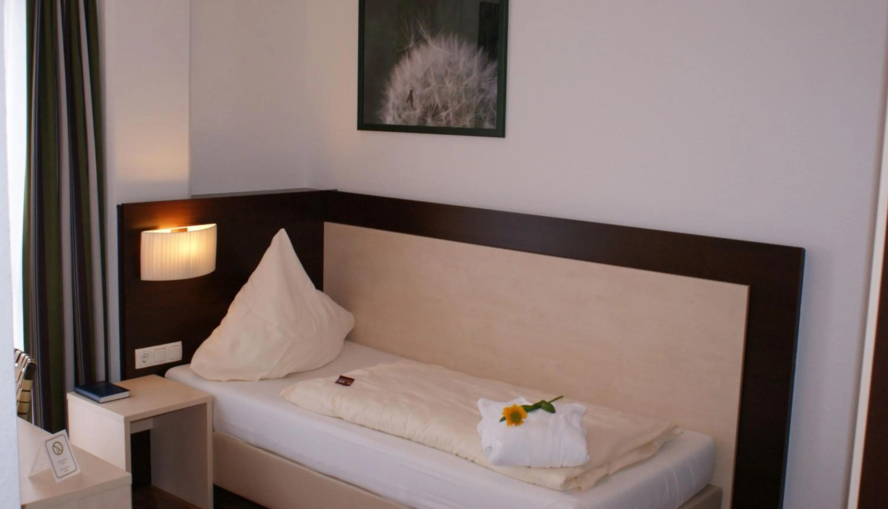 Bed in Hotel im Kornspeicher