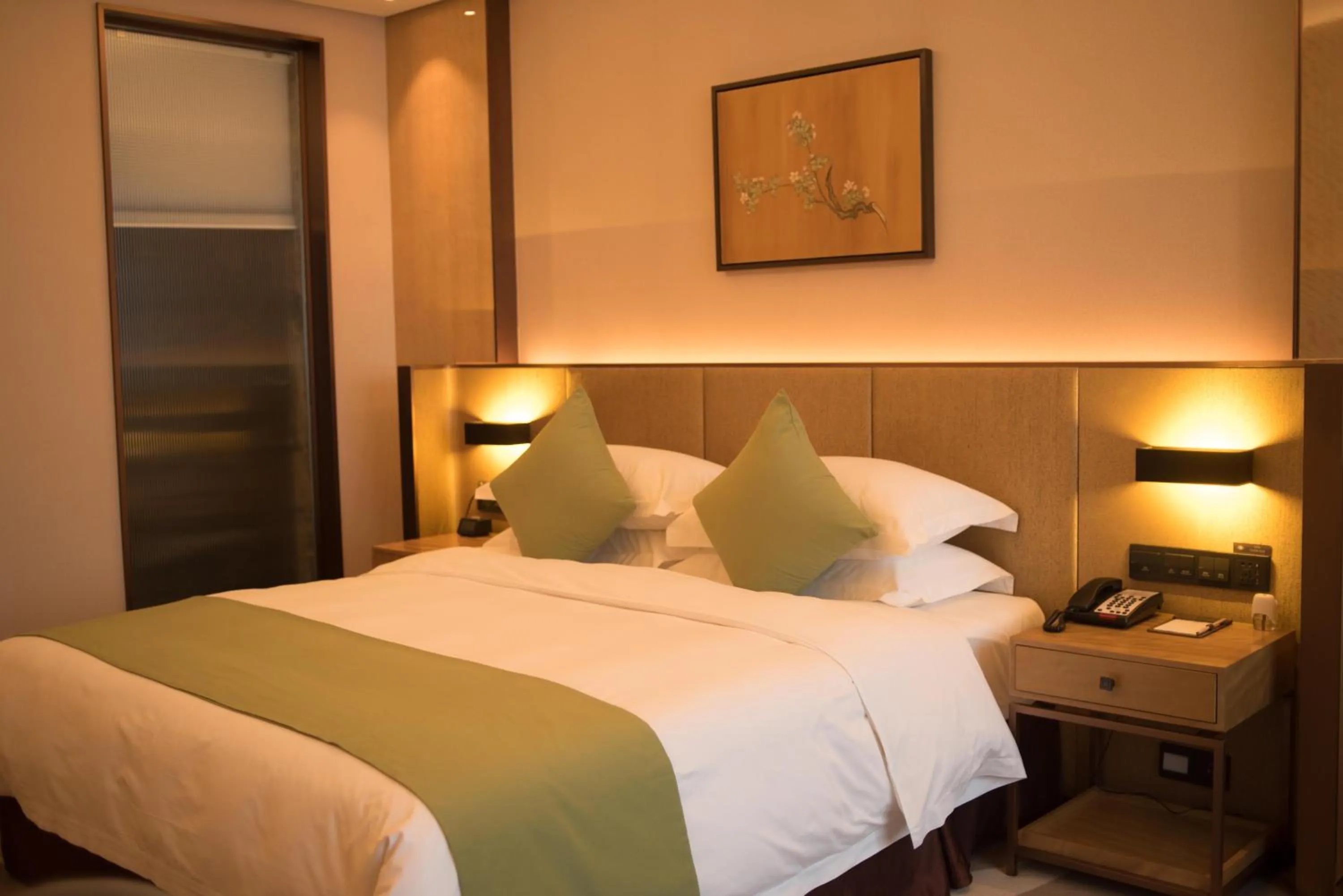 Bed in Leshan Ramada Hotel