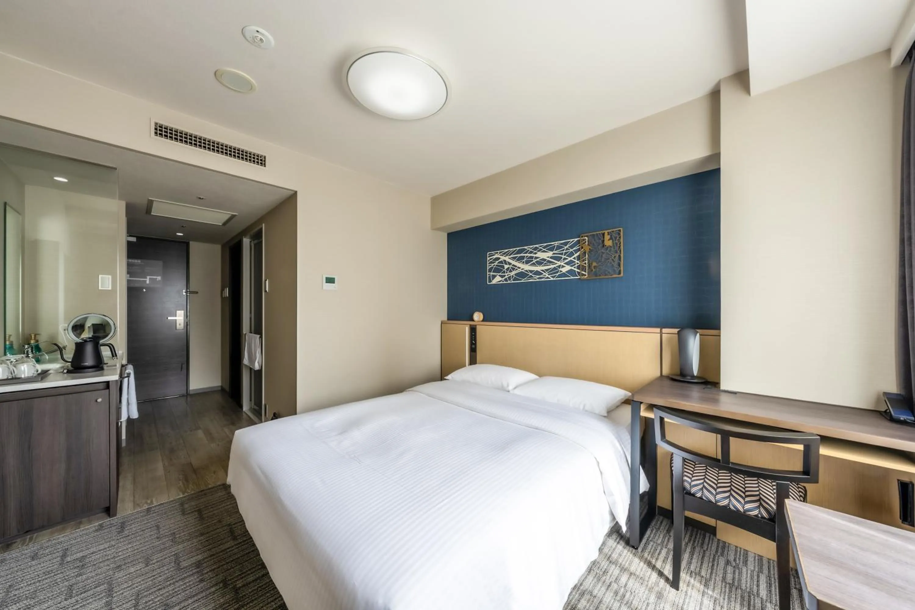 Bed in Richmond Hotel Yokohama Ekimae