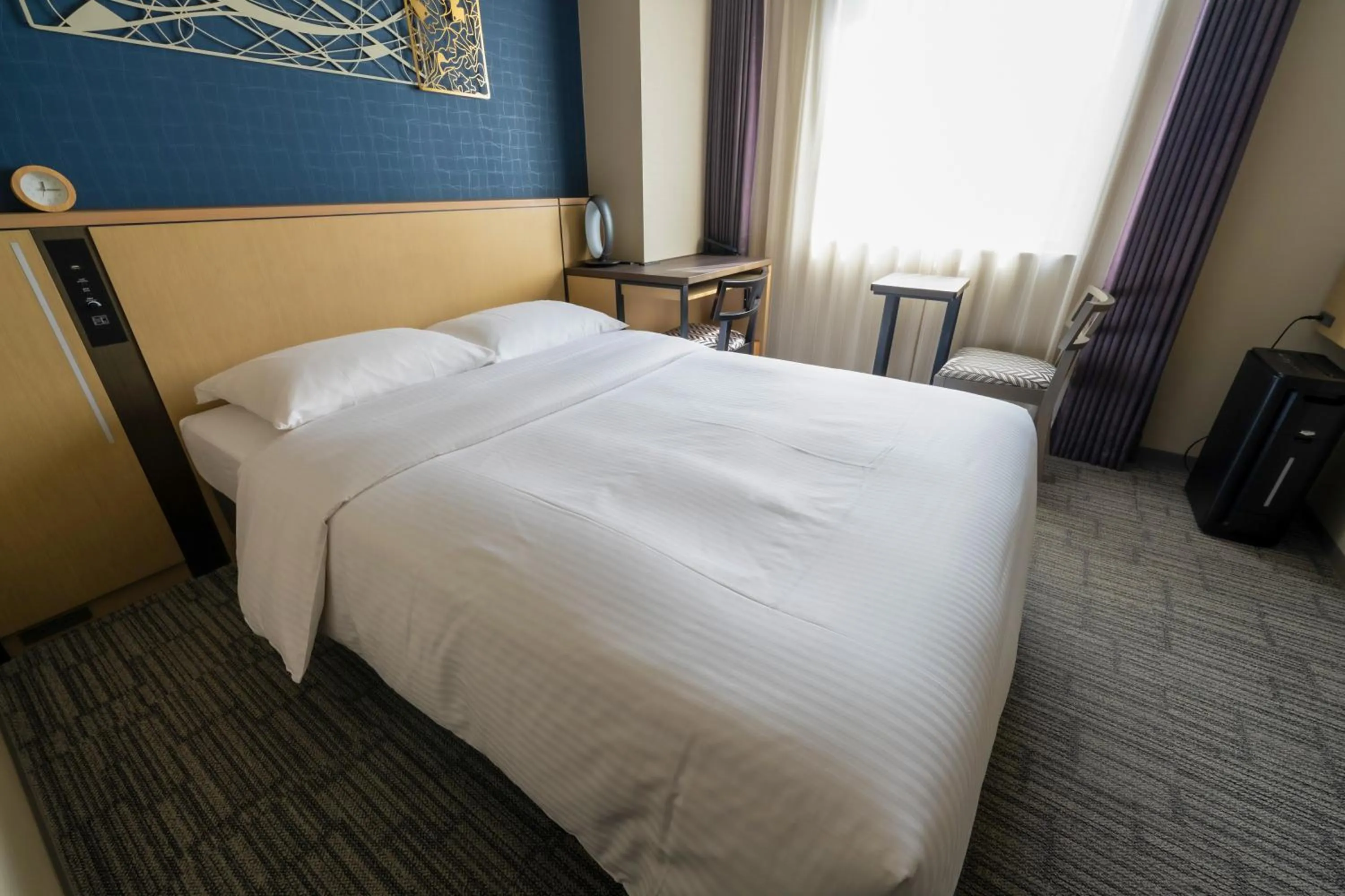Bed in Richmond Hotel Yokohama Ekimae