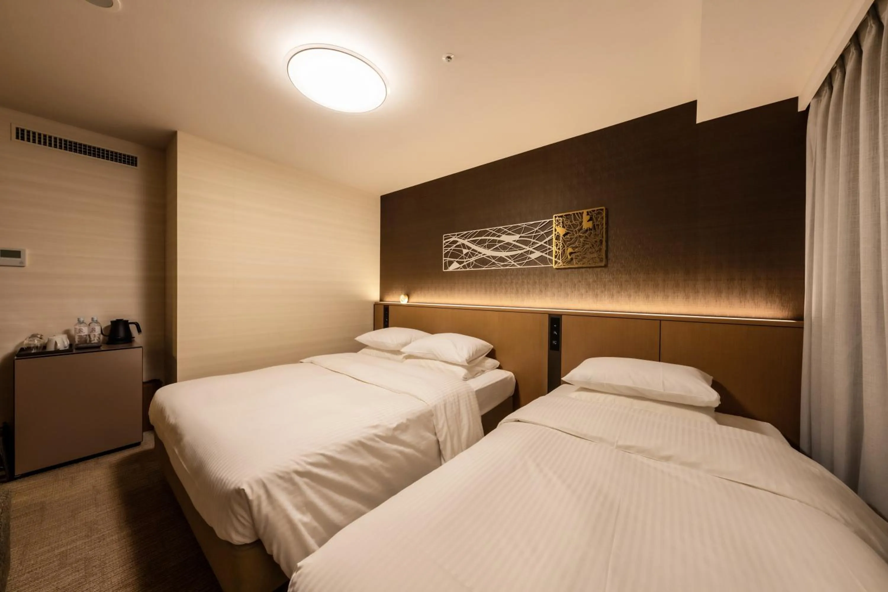 Bed in Richmond Hotel Yokohama Ekimae