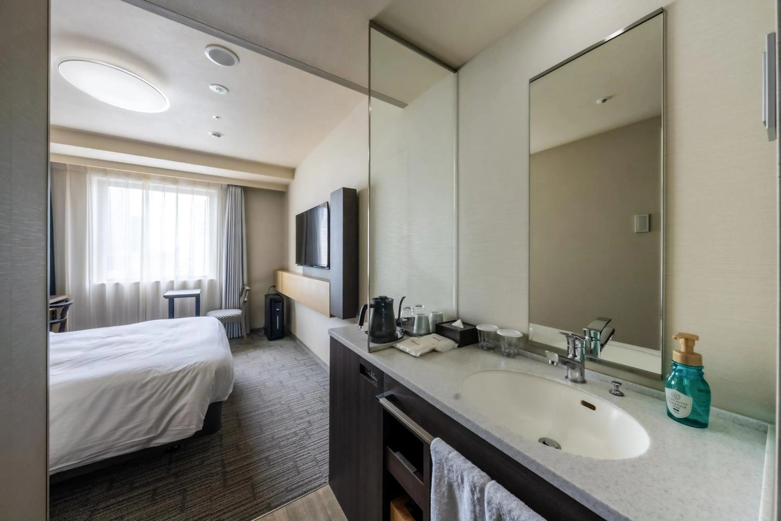 Bed in Richmond Hotel Yokohama Ekimae