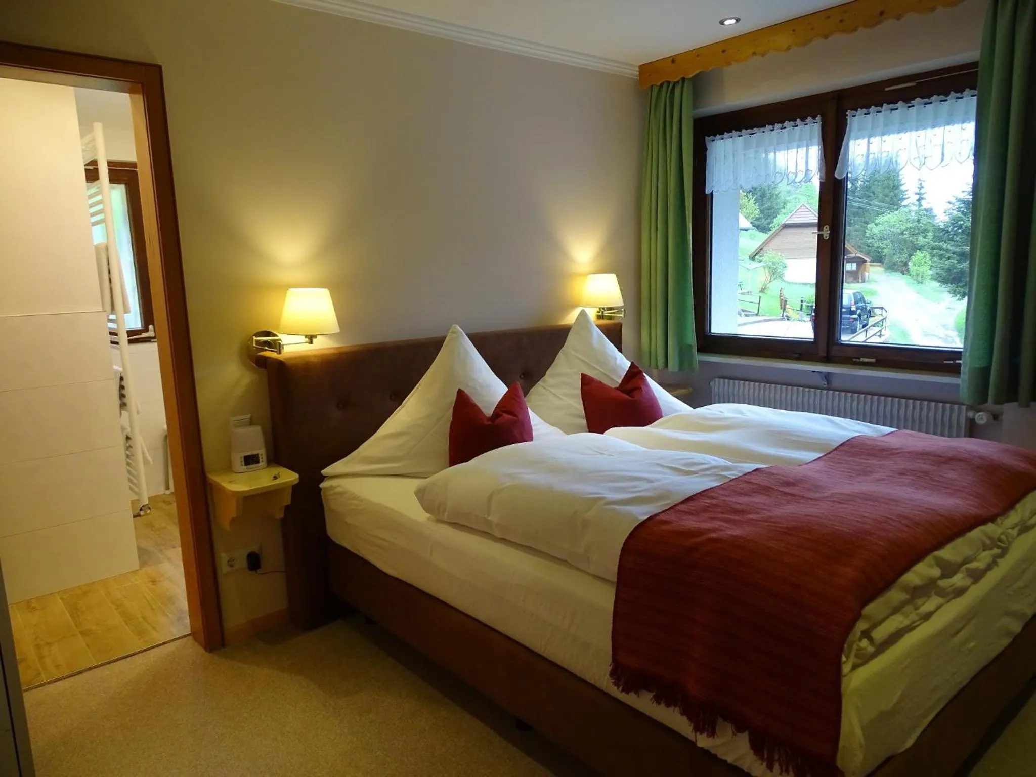 Photo of the whole room, Bed in Schwarzwald-Hotel Kraeutle
