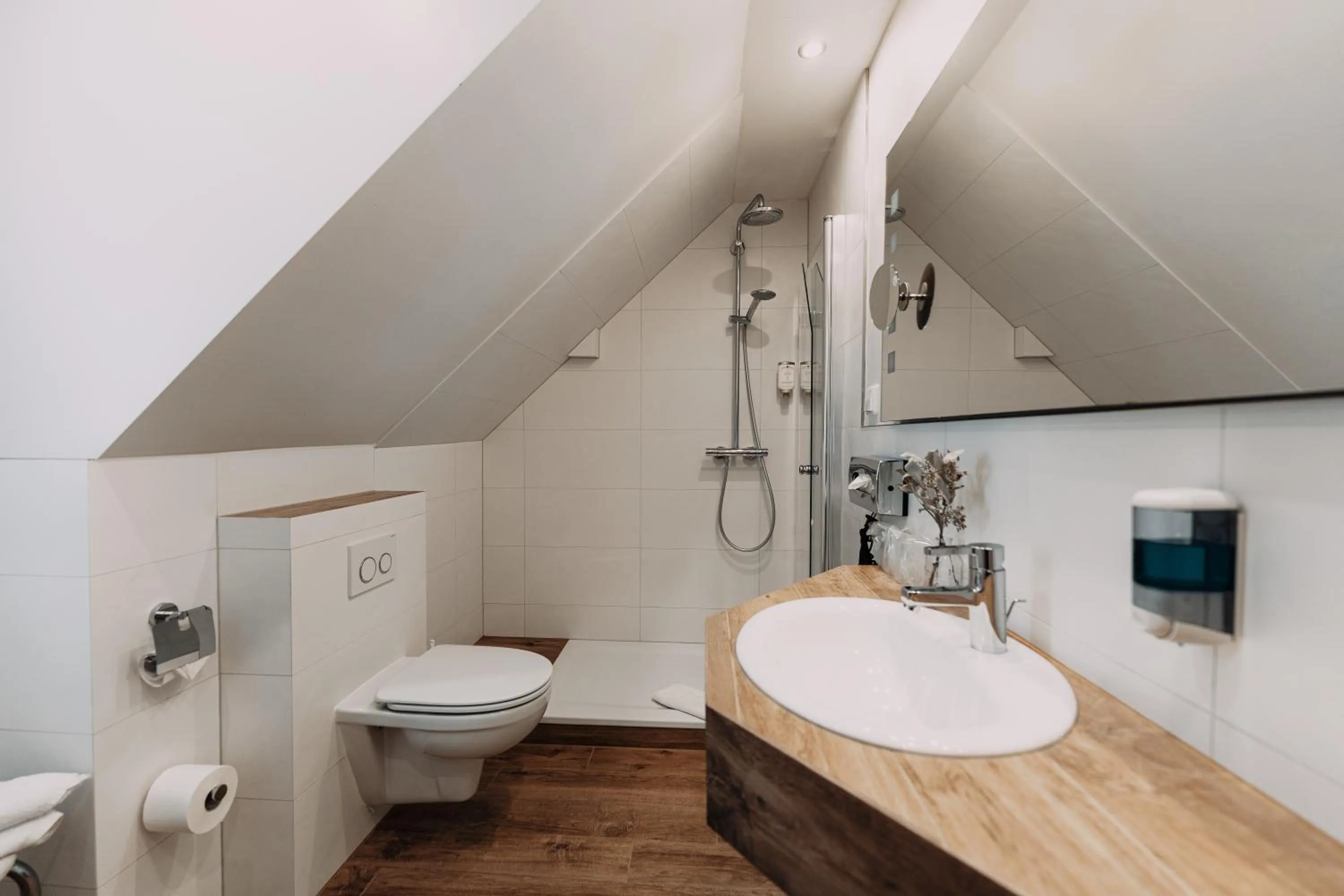 Bathroom in Schwarzwald-Hotel Kraeutle