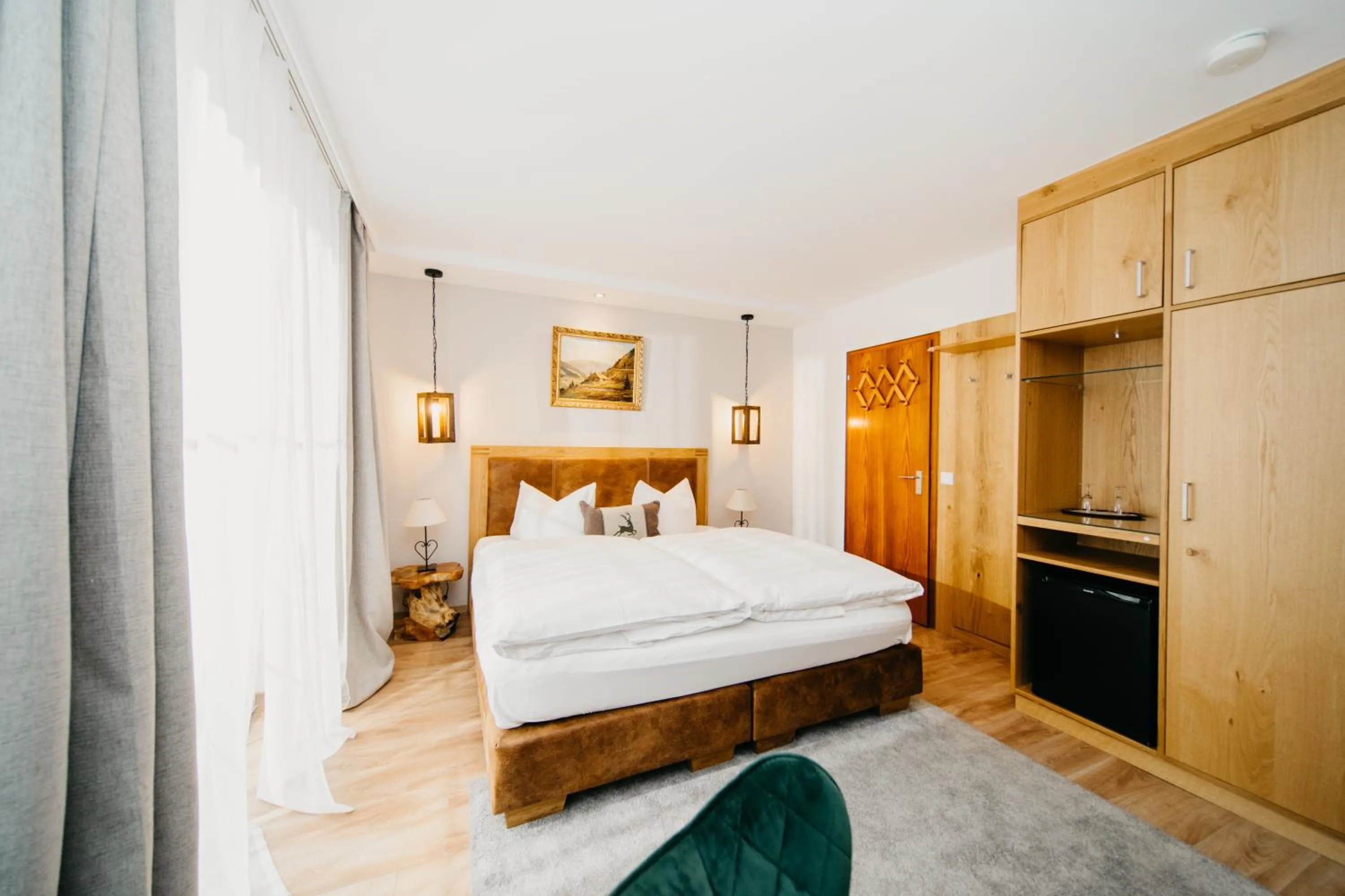 Photo of the whole room, Bed in Schwarzwald-Hotel Kraeutle