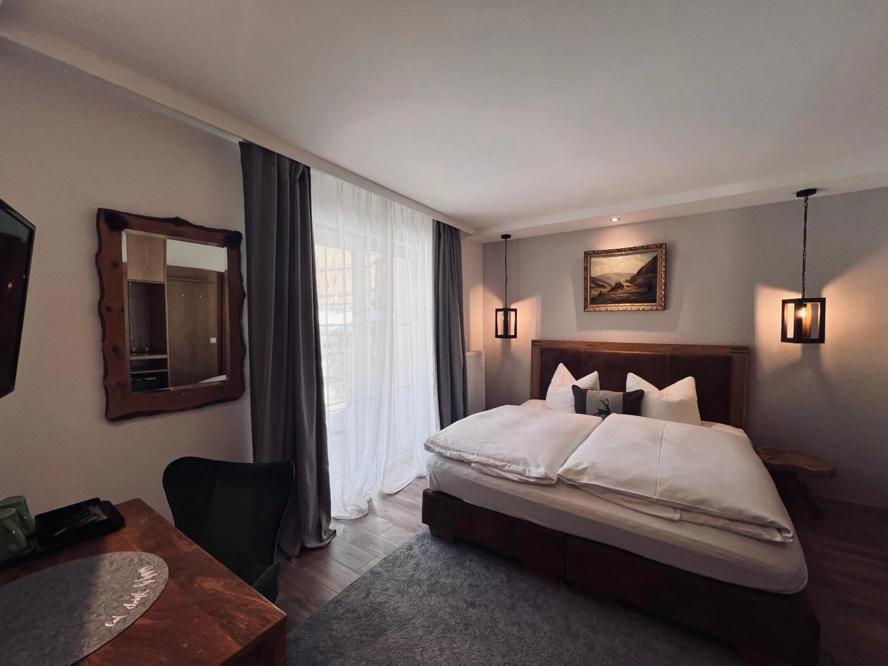 Photo of the whole room, Bed in Schwarzwald-Hotel Kraeutle