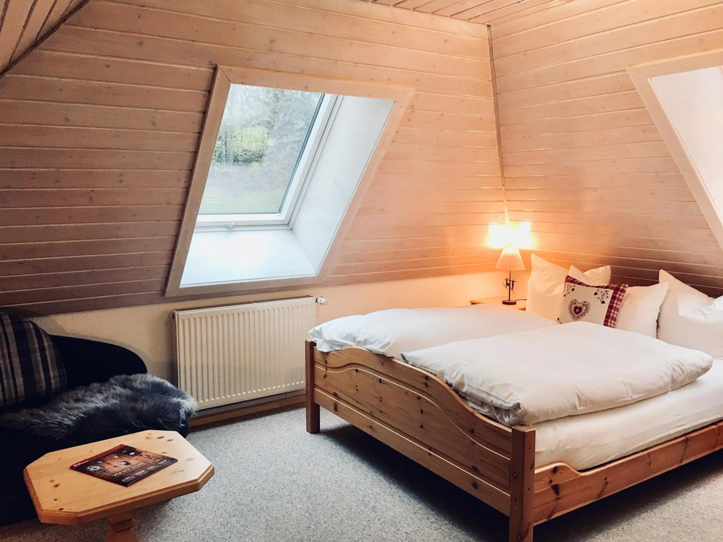 Photo of the whole room, Bed in Schwarzwald-Hotel Kraeutle