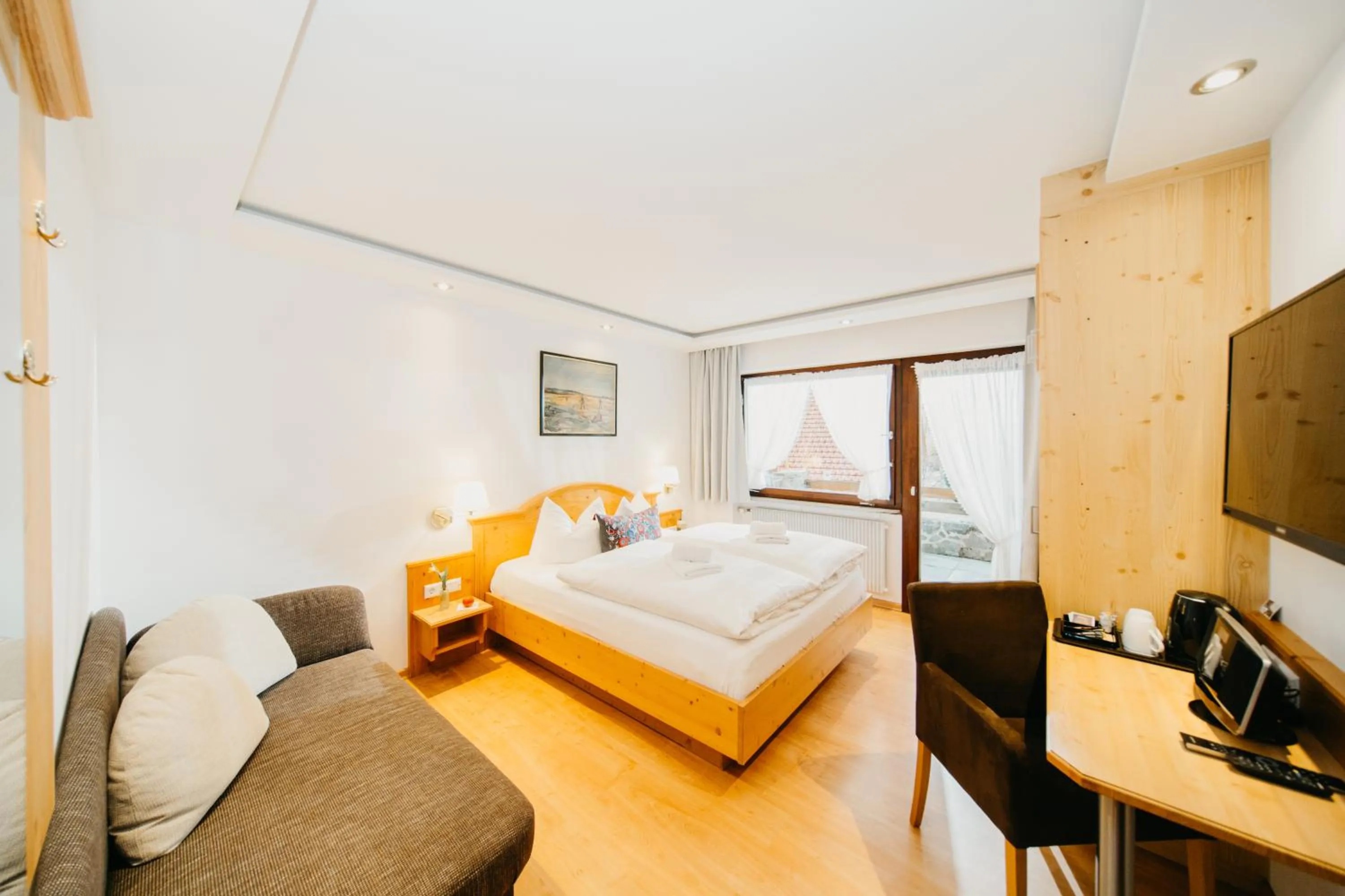 Photo of the whole room, Bed in Schwarzwald-Hotel Kraeutle