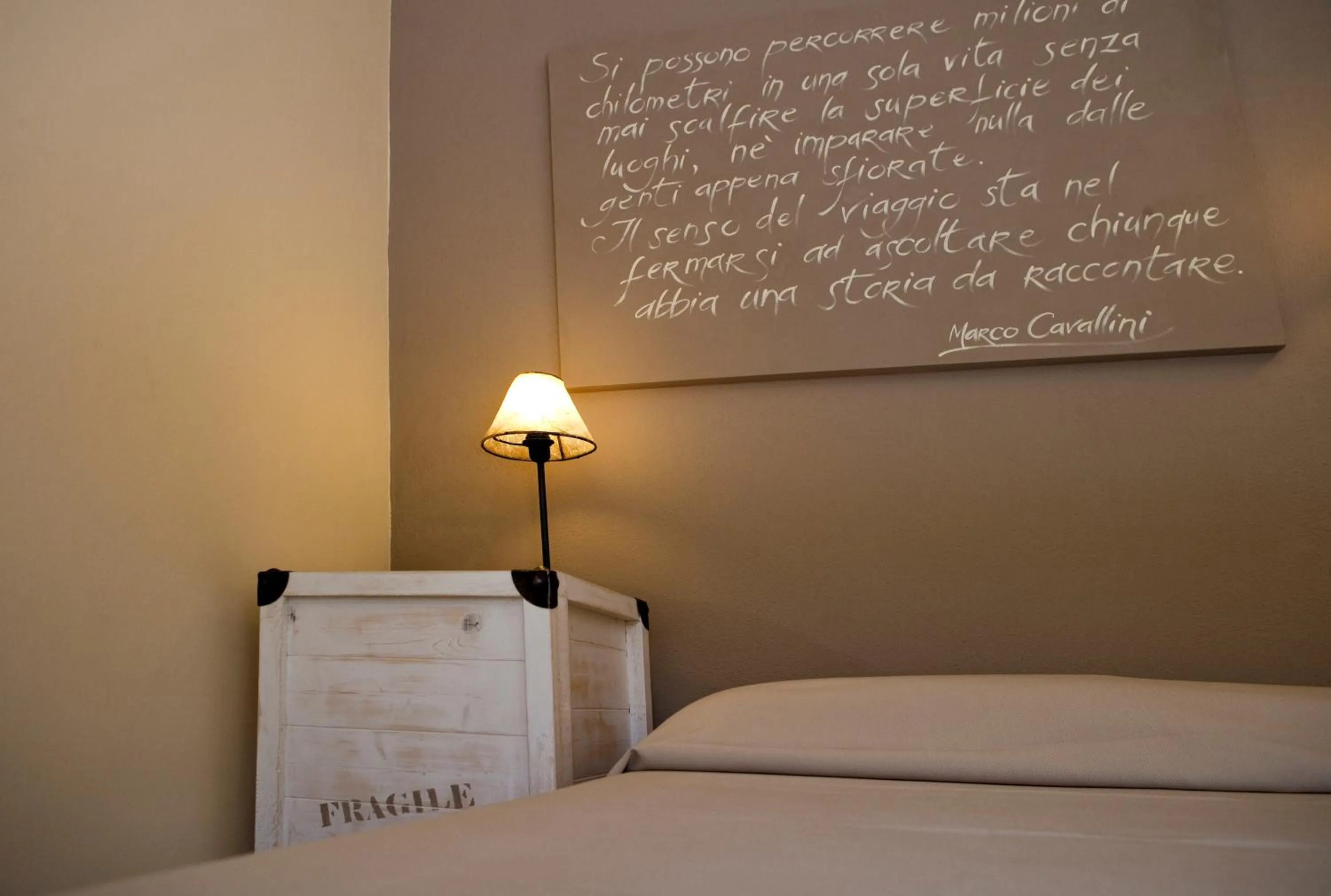 Decorative detail, Bed in Hotel Cernia Isola Botanica