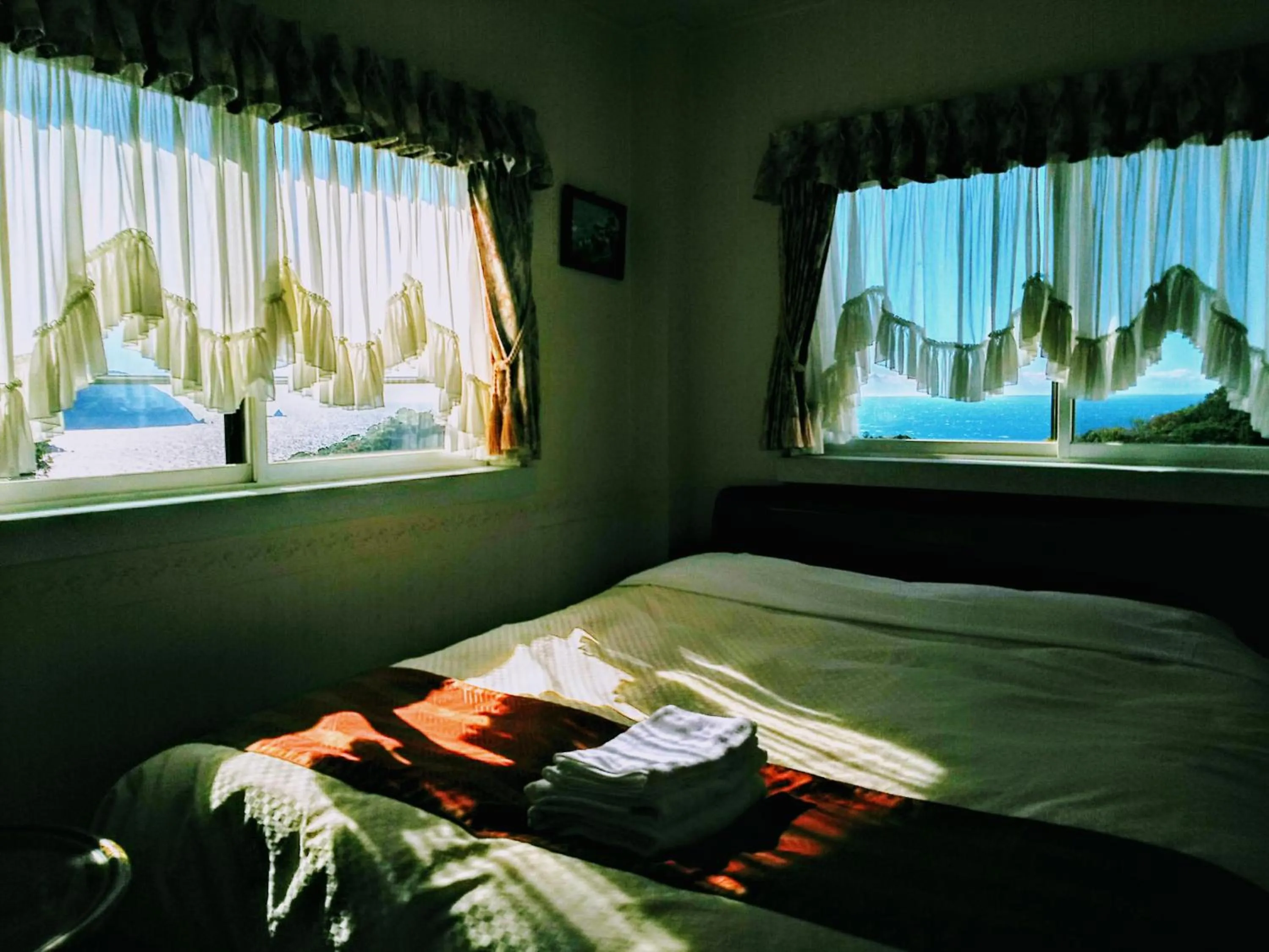 Bed in Koibito Misaki Pension Marine Mates