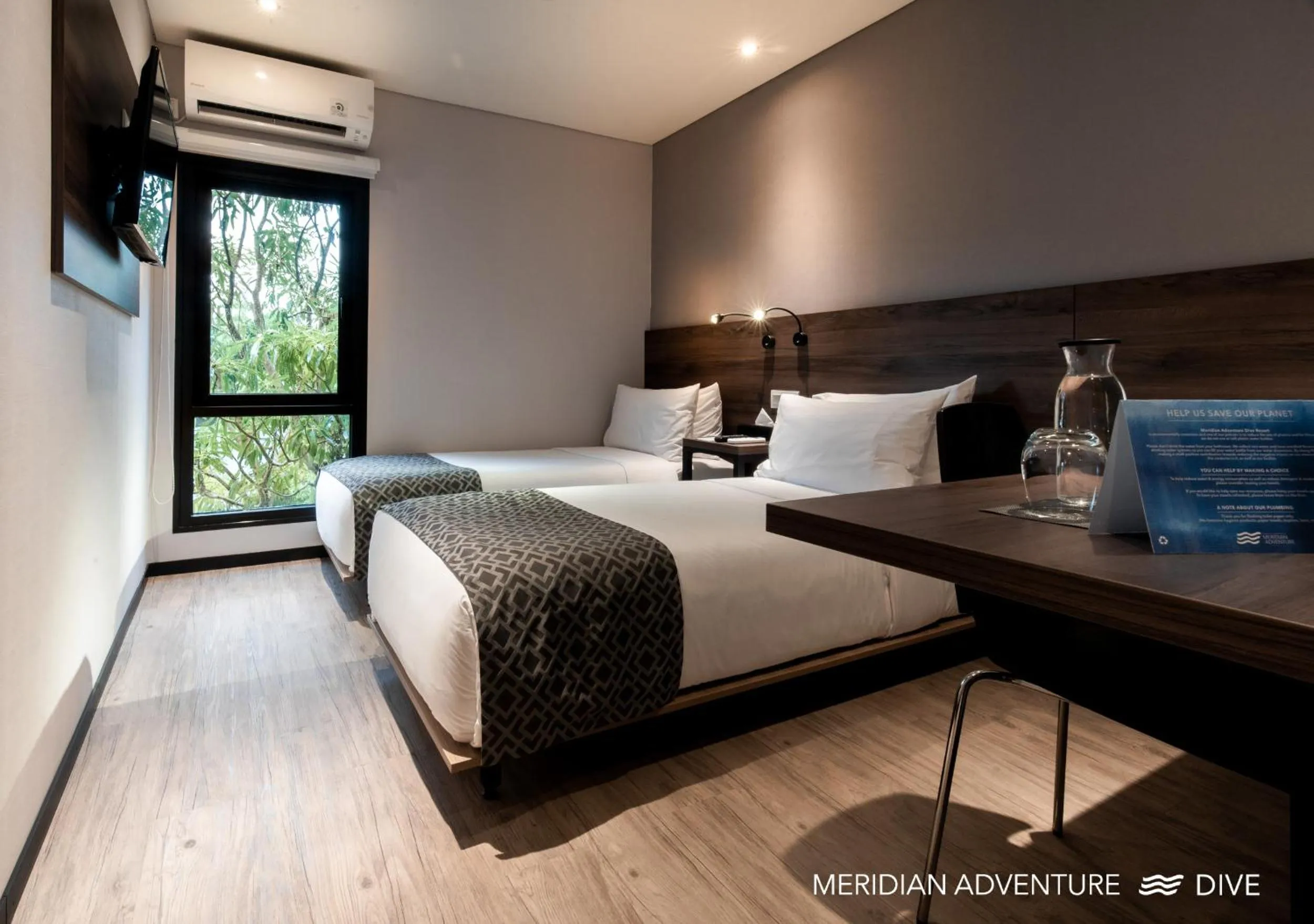 Bed in Meridian Adventure Marina Club & Resort