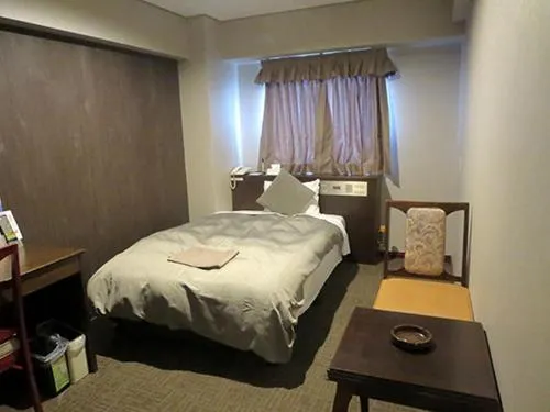 Bed in Hotel Rumieru Hyuga