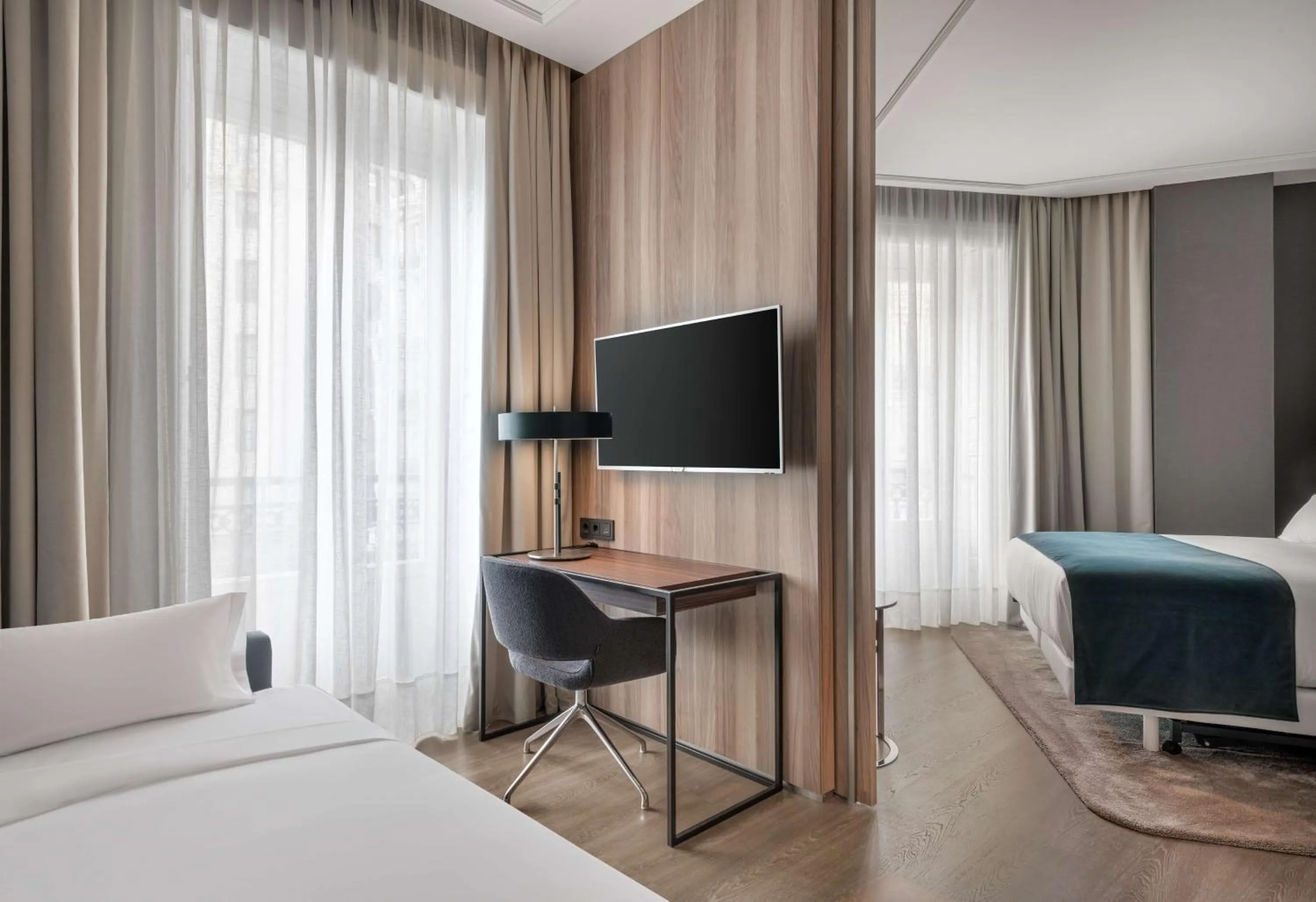 Photo of the whole room, Bed in NH Collection Madrid Gran Vía