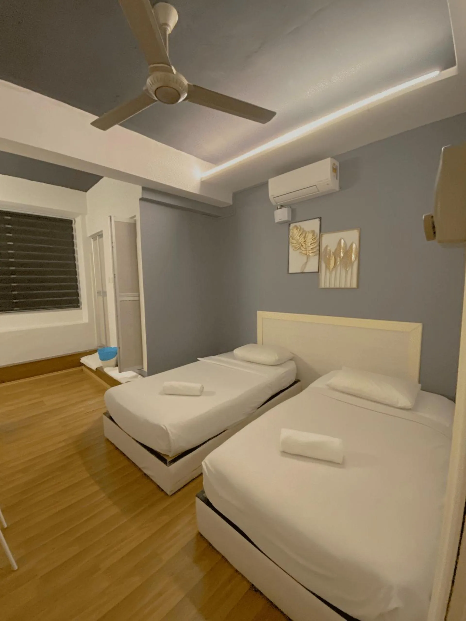 Bed in Travelogue Guest House