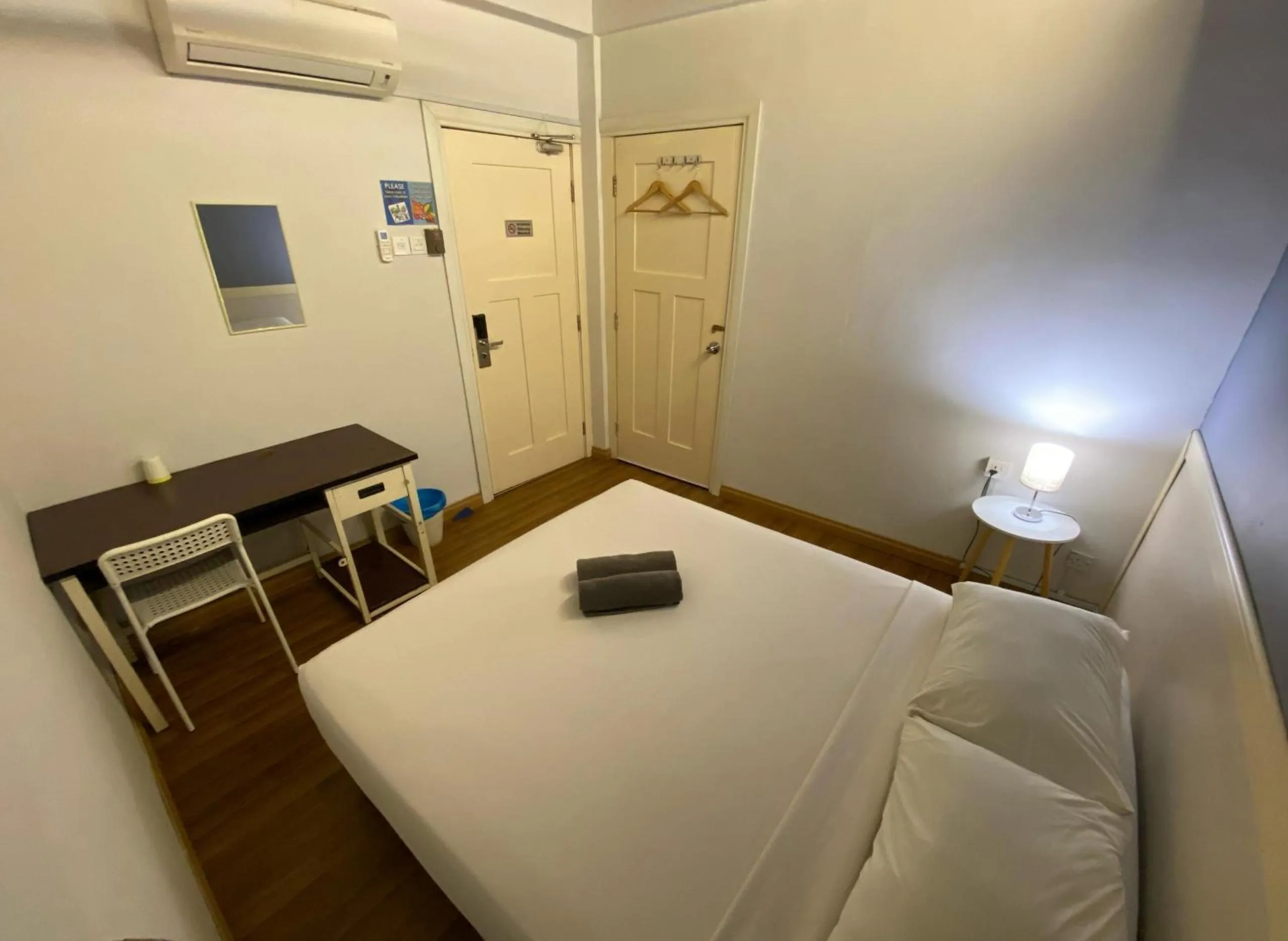 Bed in Travelogue Guest House