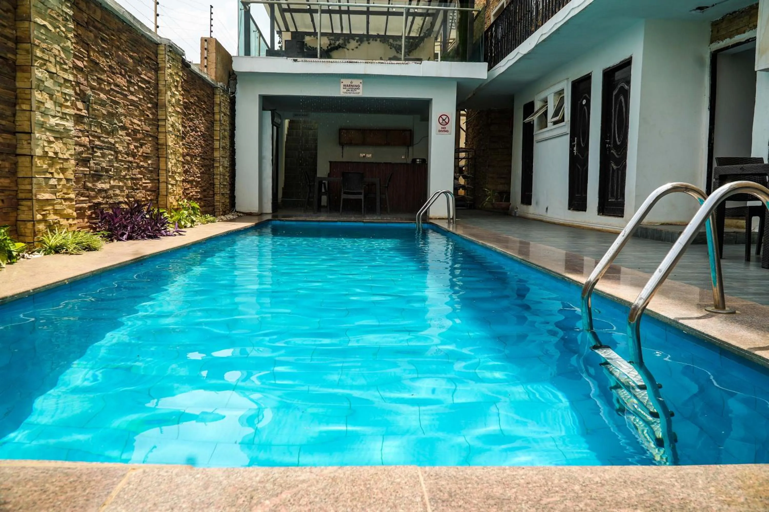 Swimming pool in Amor Hotels Abuja