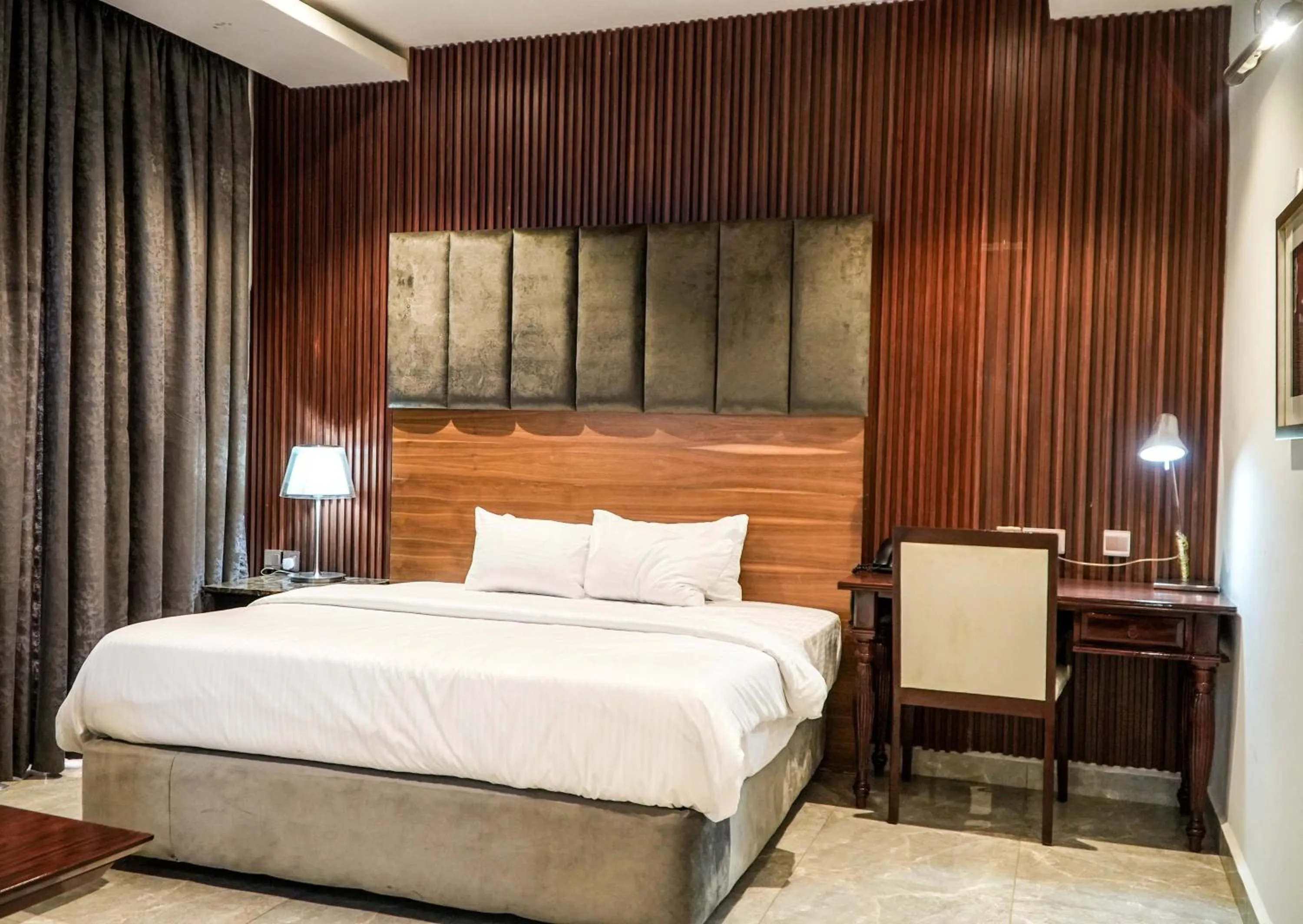 View (from property/room), Bed in Amor Hotels Abuja