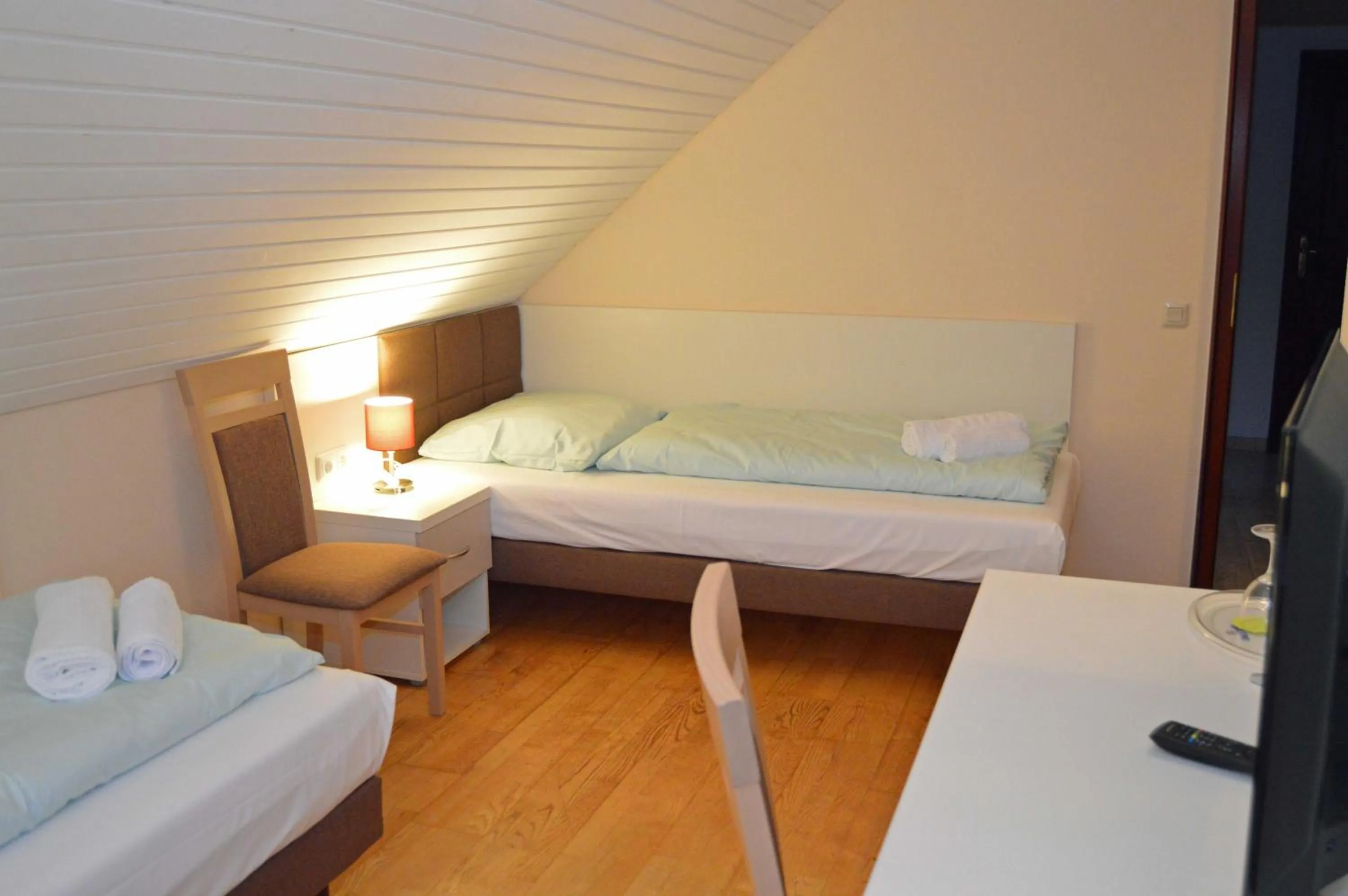 Photo of the whole room, Bed in G&H Hotel Rosengarten