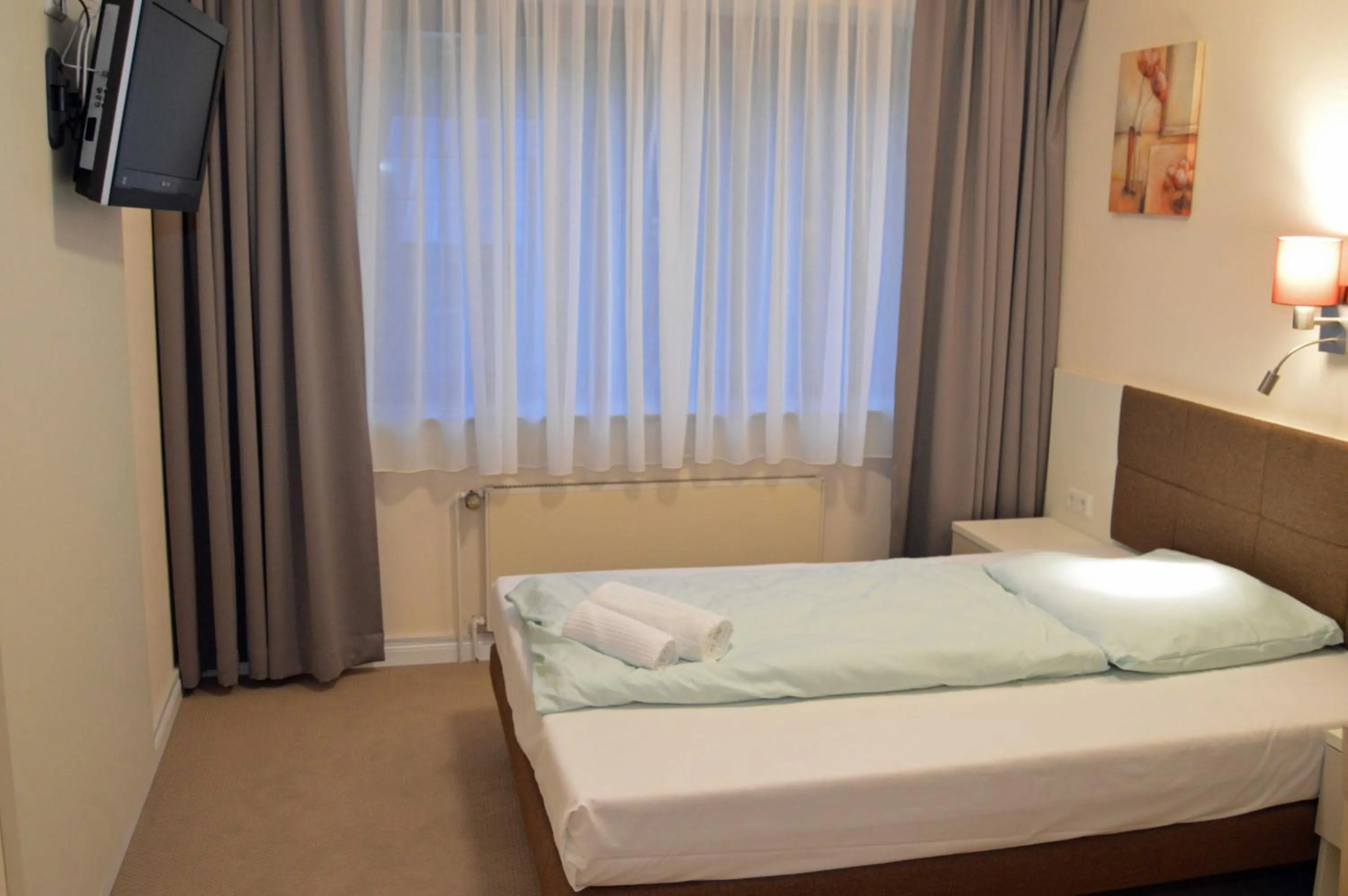 Photo of the whole room, Bed in G&H Hotel Rosengarten