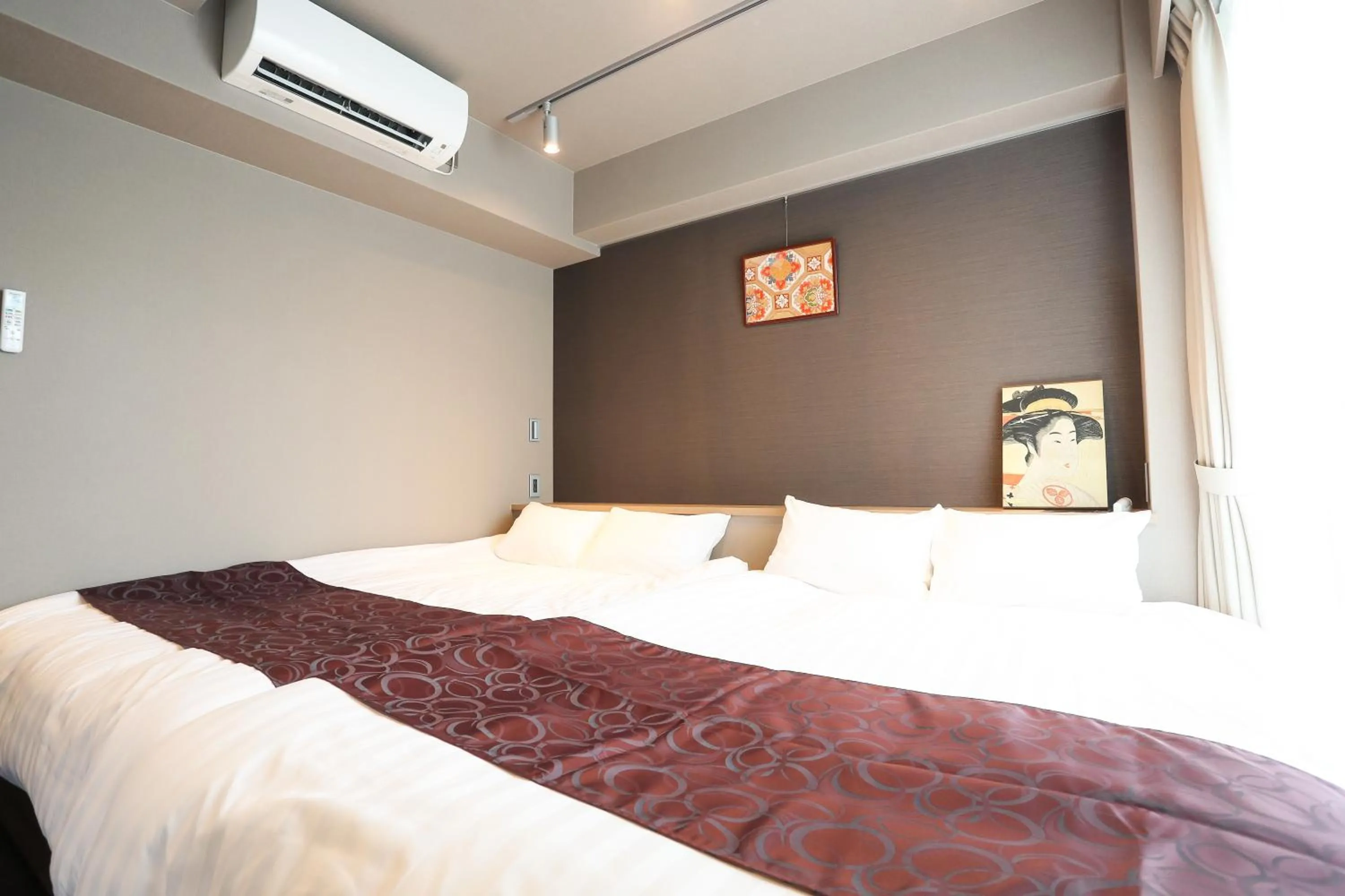 Bed in Apartment Hotel 7key S Kyoto