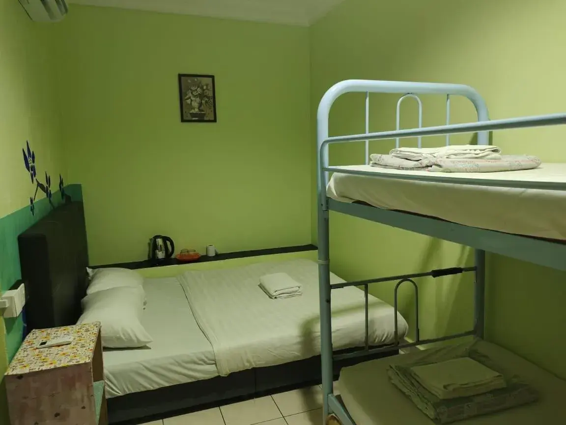 Family Room with Private Bathroom (No Window) in Borneo Gaya Lodge Family Room with Private Bathroom (No Window) in Borneo Gaya Lodge