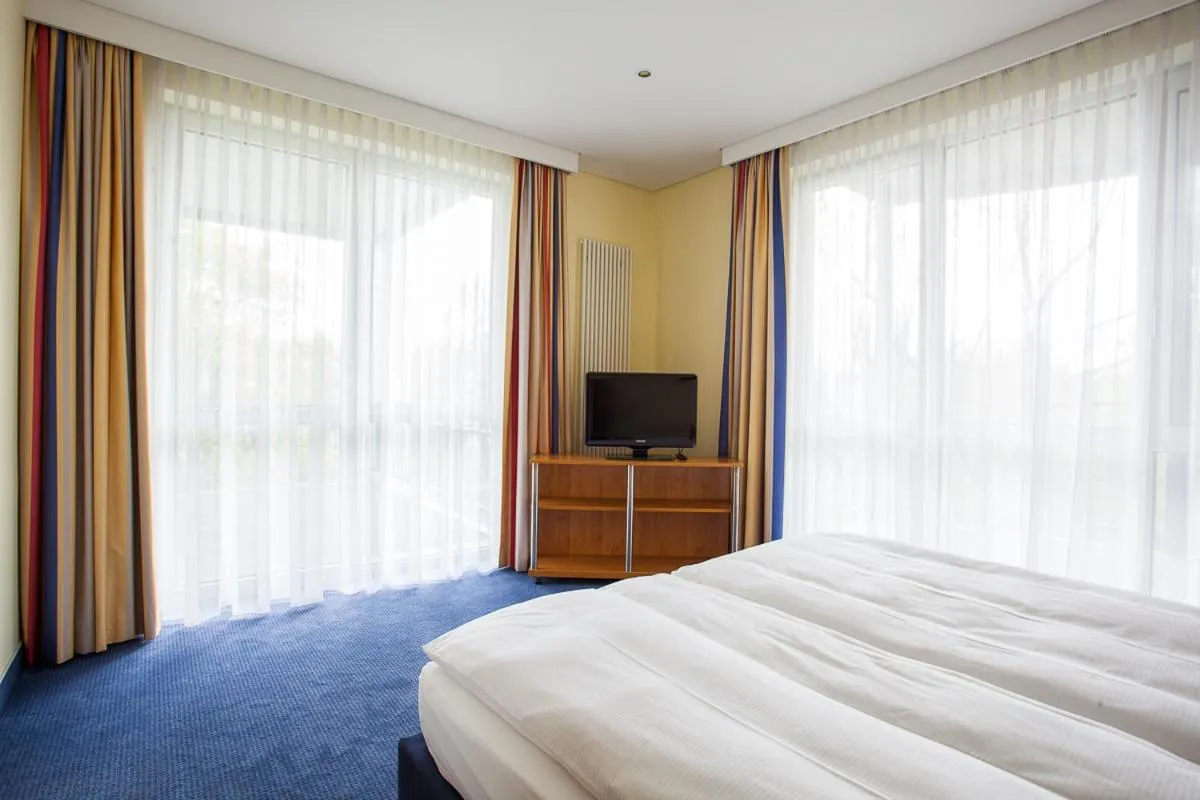 Bedroom, Bed in Aparion Apartments Berlin