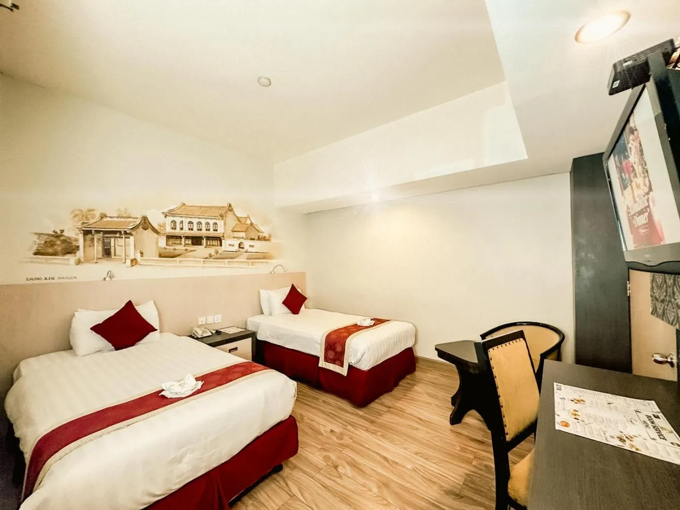 Bed in Hermes Palace Hotel Medan