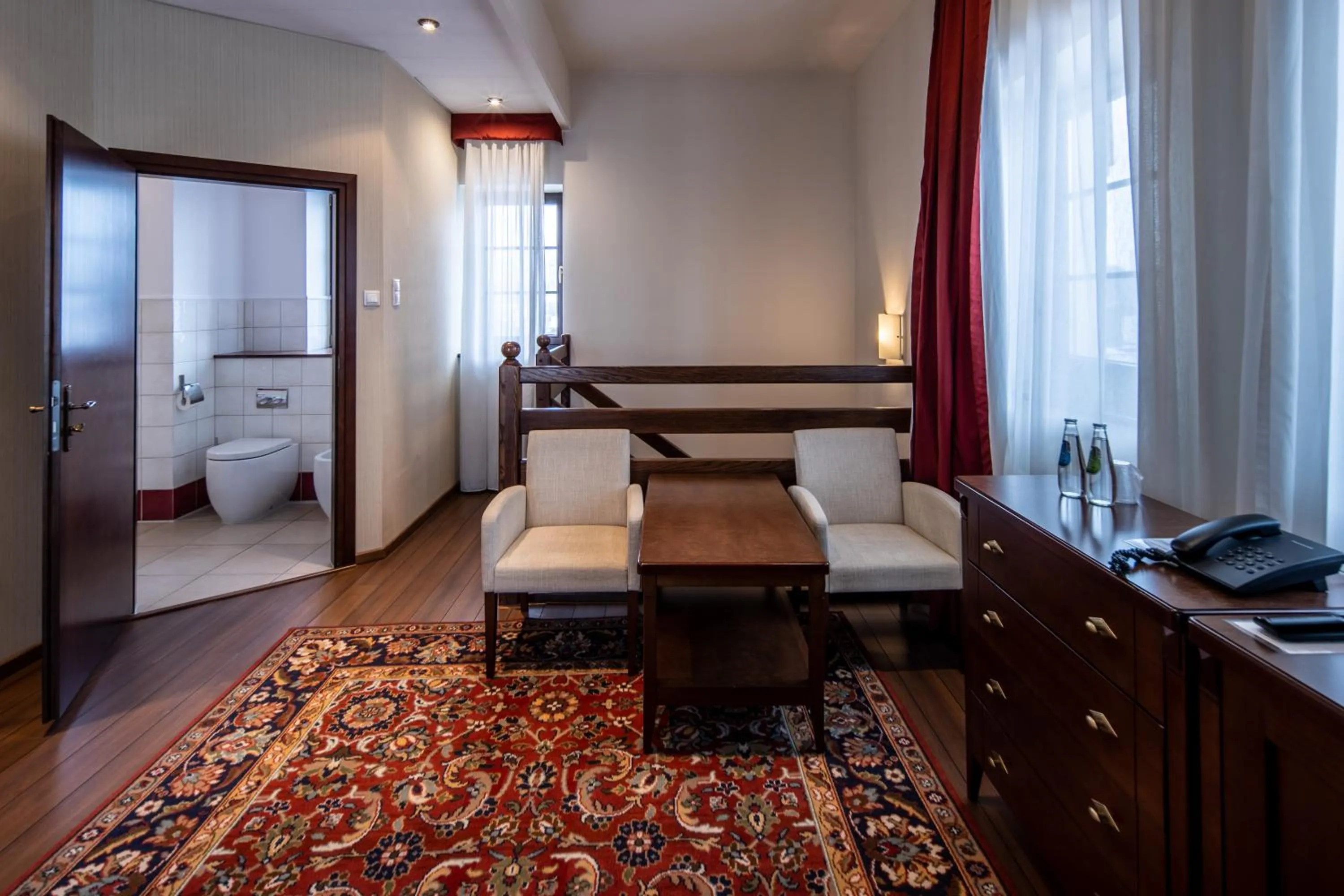 Seating area, Bed in Hotel Słoneczny Młyn