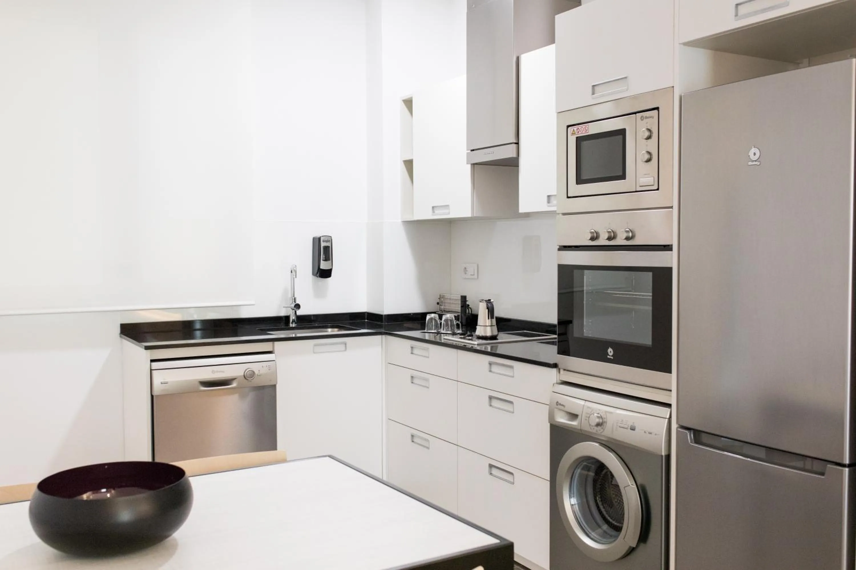 Kitchen or kitchenette in Mon Suites San Martin