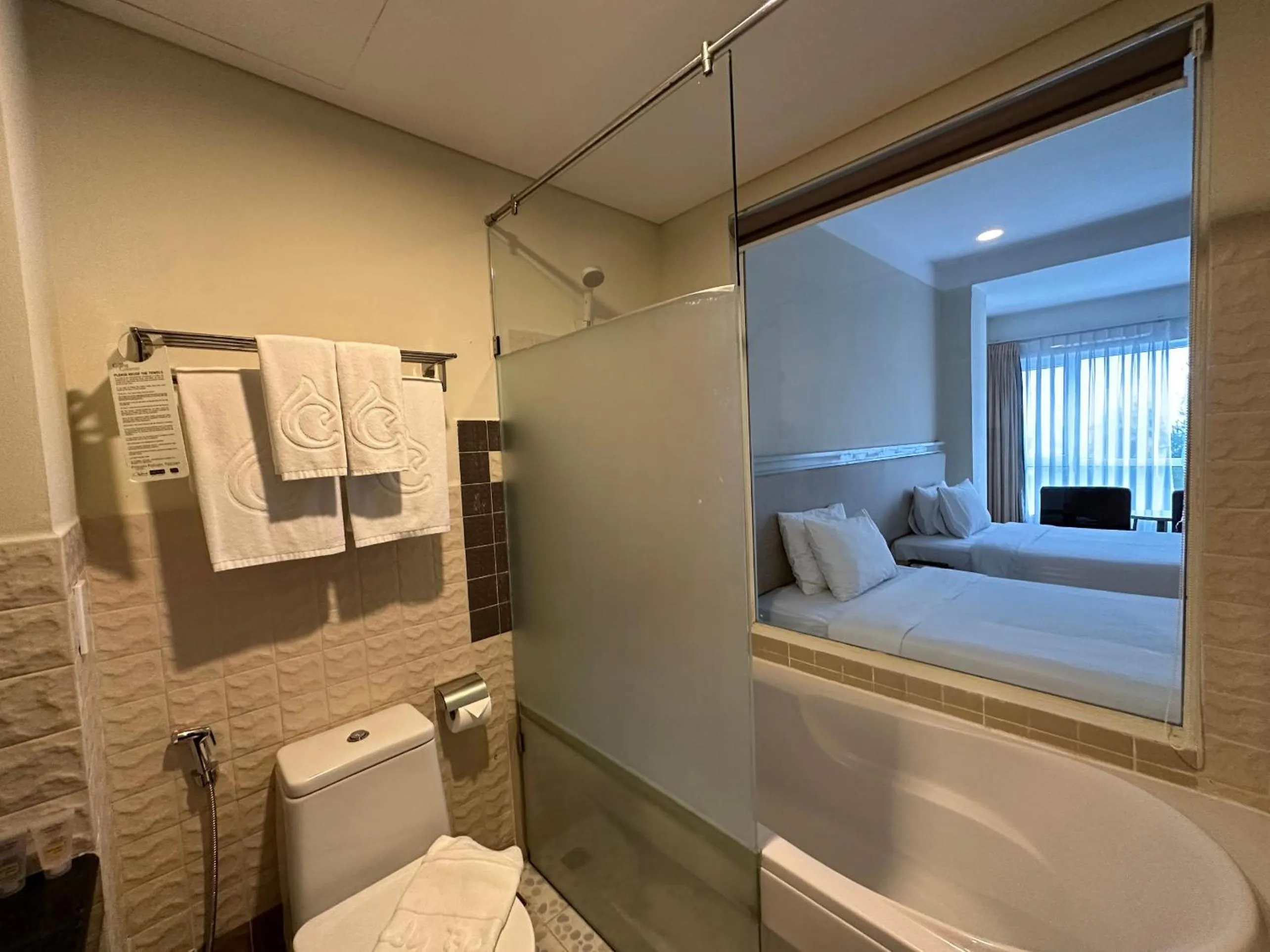 Bathroom, Bed in Sandy Beach Non Nuoc Resort