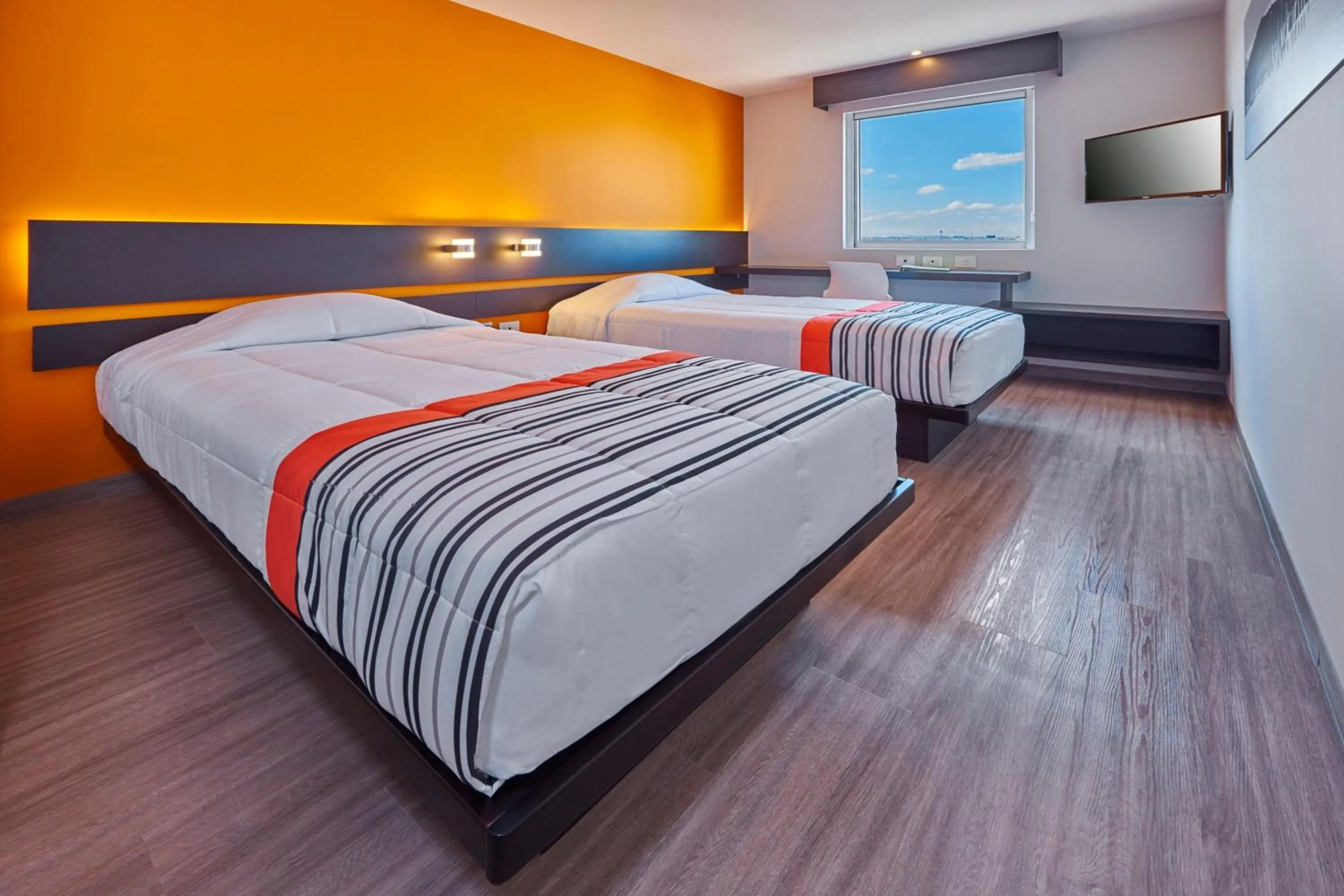 Photo of the whole room, Bed in City Express Junior by Marriott Leon Centro de Convenciones