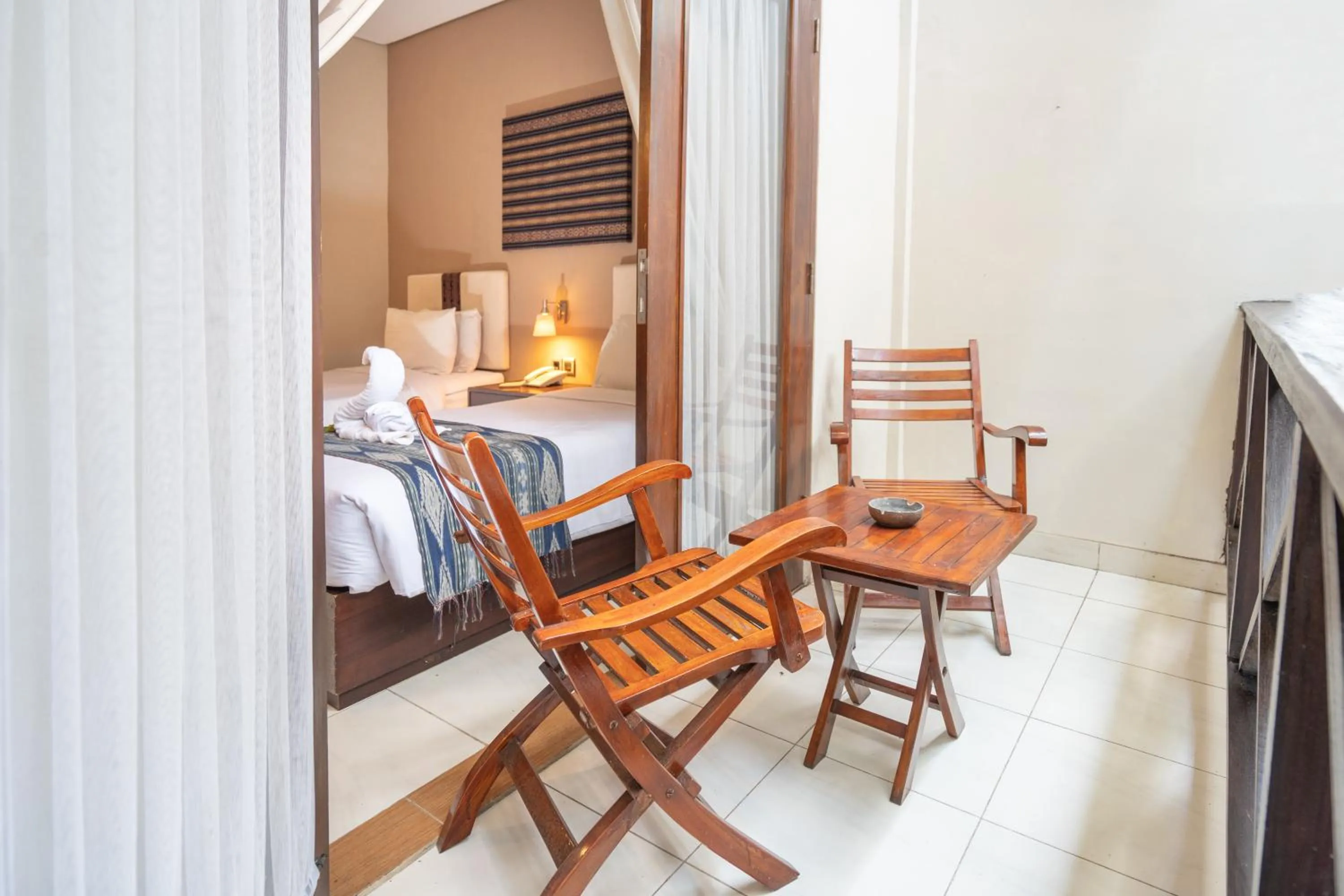 Balcony/Terrace, Bed in Samawa Transit Hotel