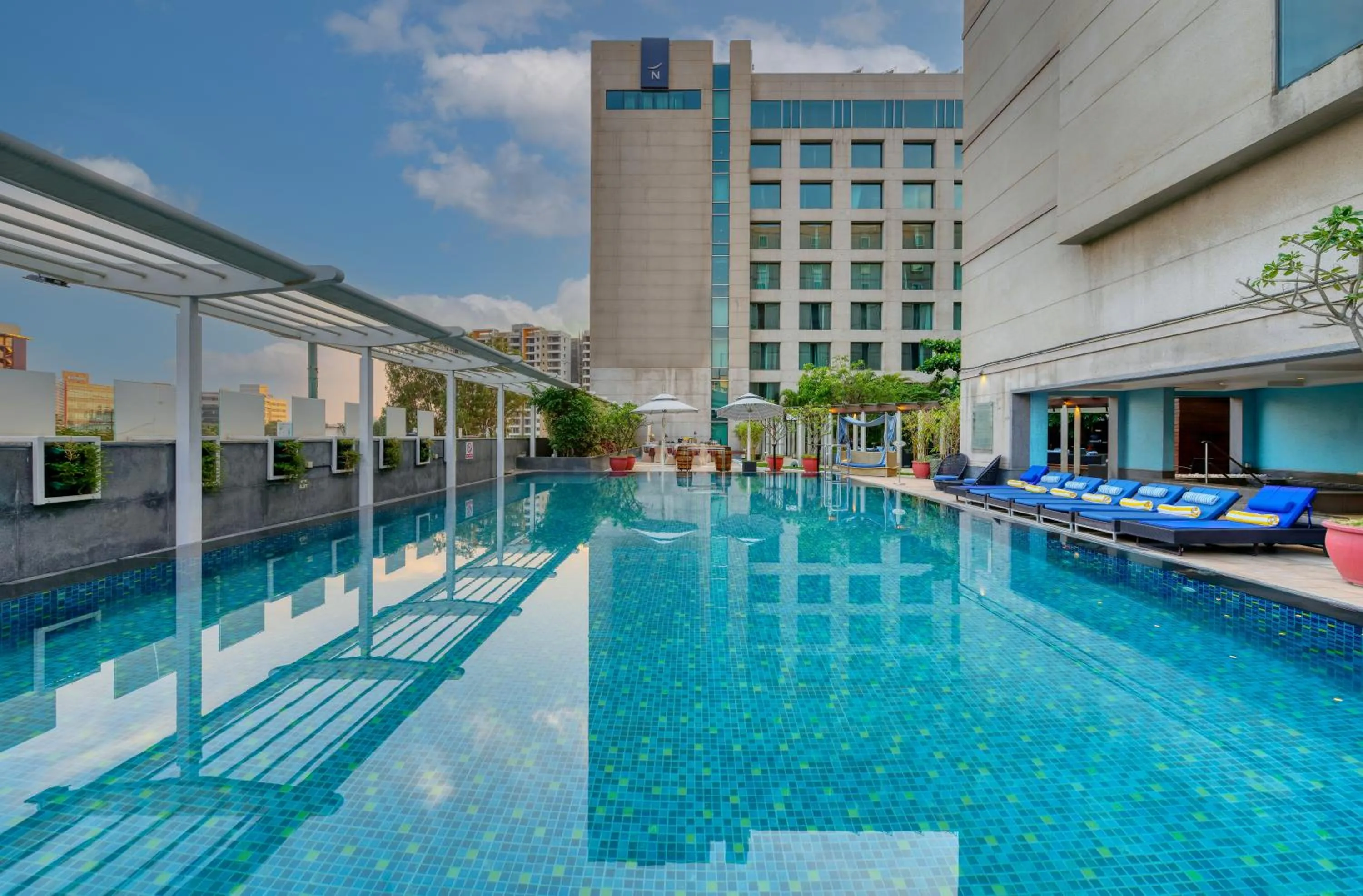 Swimming pool in Novotel Bengaluru Outer Ring Road