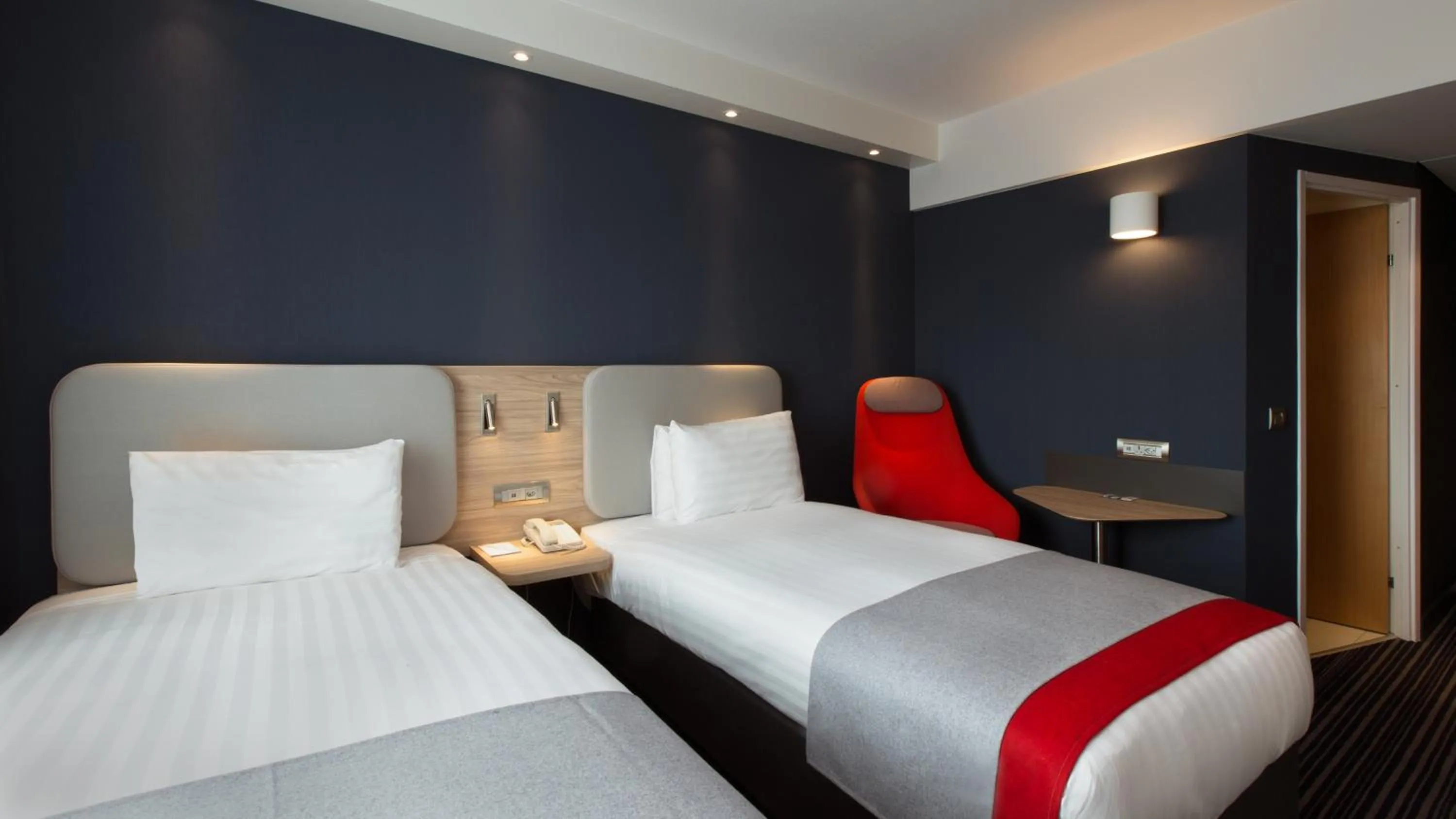 Property building, Bed in Holiday Inn Express Geneva Airport by IHG