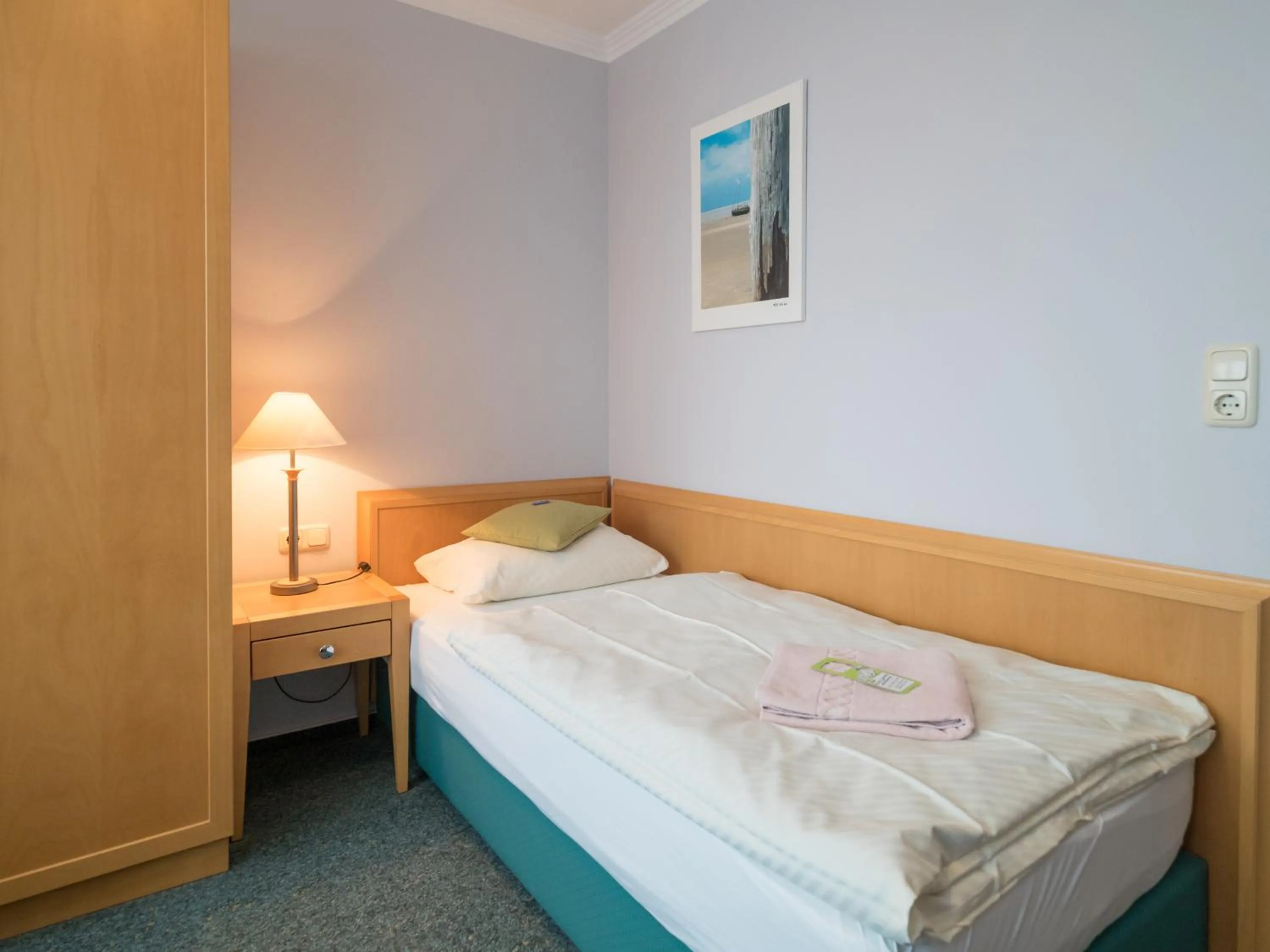 Photo of the whole room, Bed in Hotel Spiekeroog