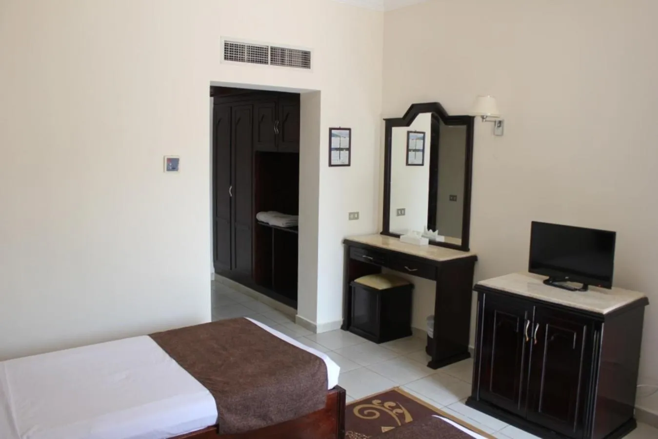 Photo of the whole room, TV/Entertainment Center in Tivoli Hotel Aqua Park