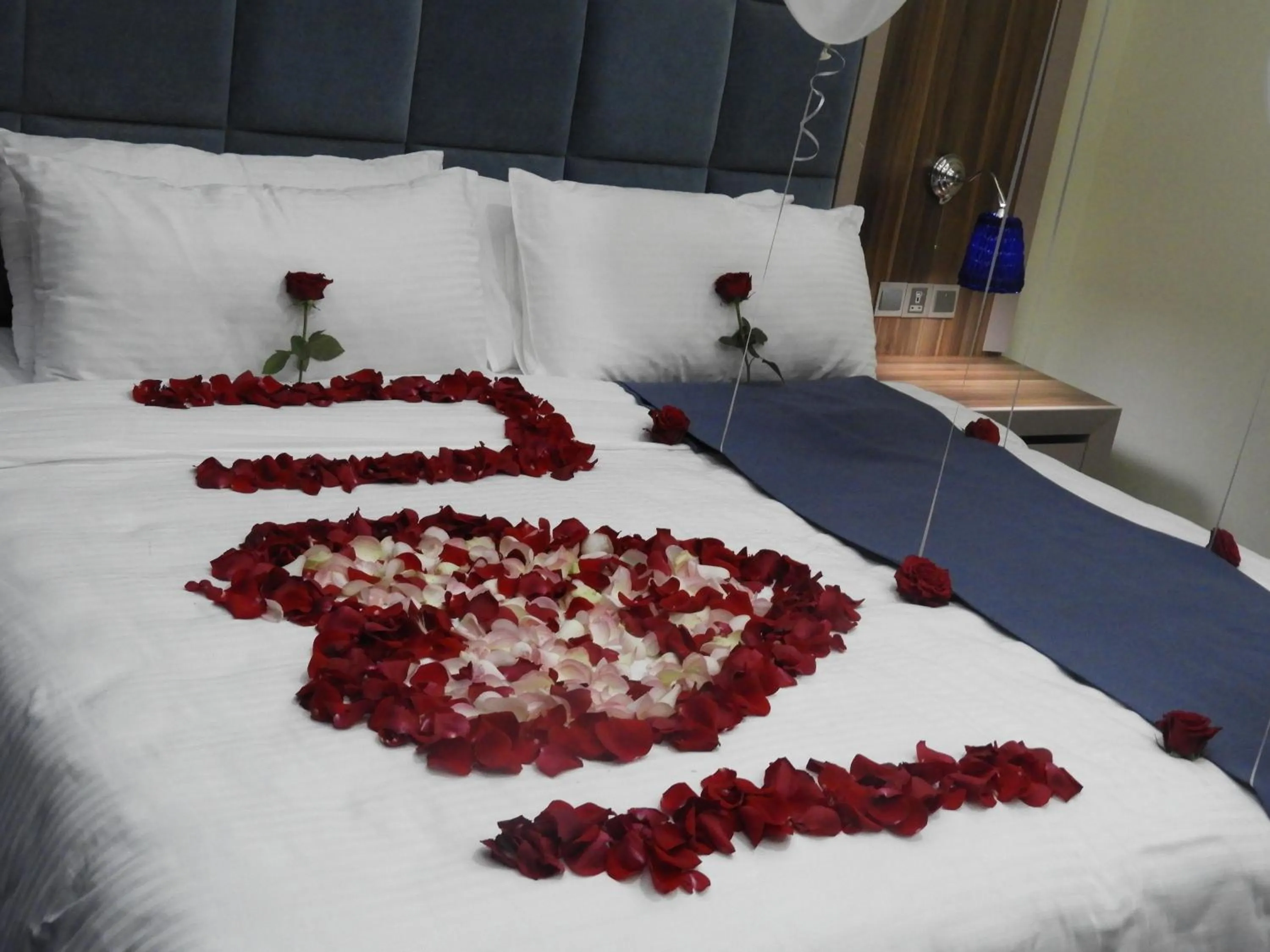 Bed in Swiss Blue serviced Apartments- Al Zahra