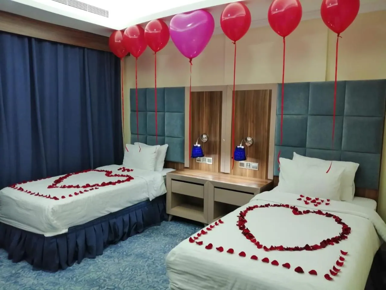 Bed in Swiss Blue serviced Apartments- Al Zahra