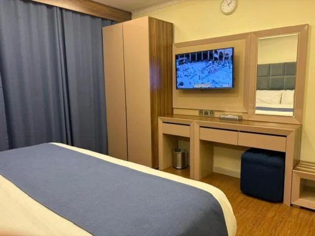 Bed in Swiss Blue serviced Apartments- Al Zahra