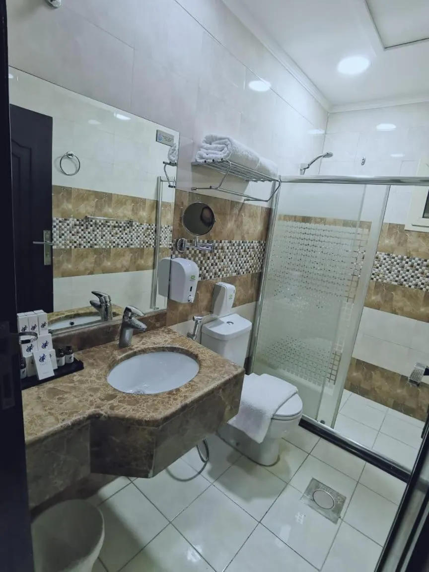 Bathroom in Swiss Blue serviced Apartments- Al Zahra