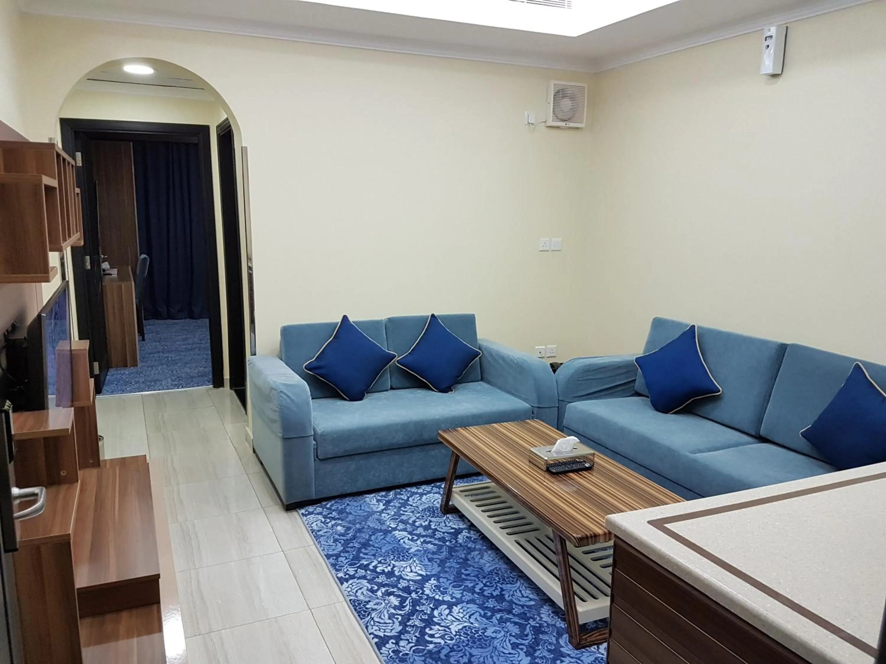 Living room in Swiss Blue serviced Apartments- Al Zahra