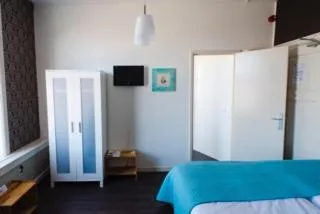 Decorative detail, Bed in Hotel Grand Cafe Deight