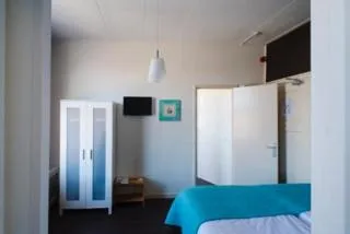 Decorative detail, Bed in Hotel Grand Cafe Deight