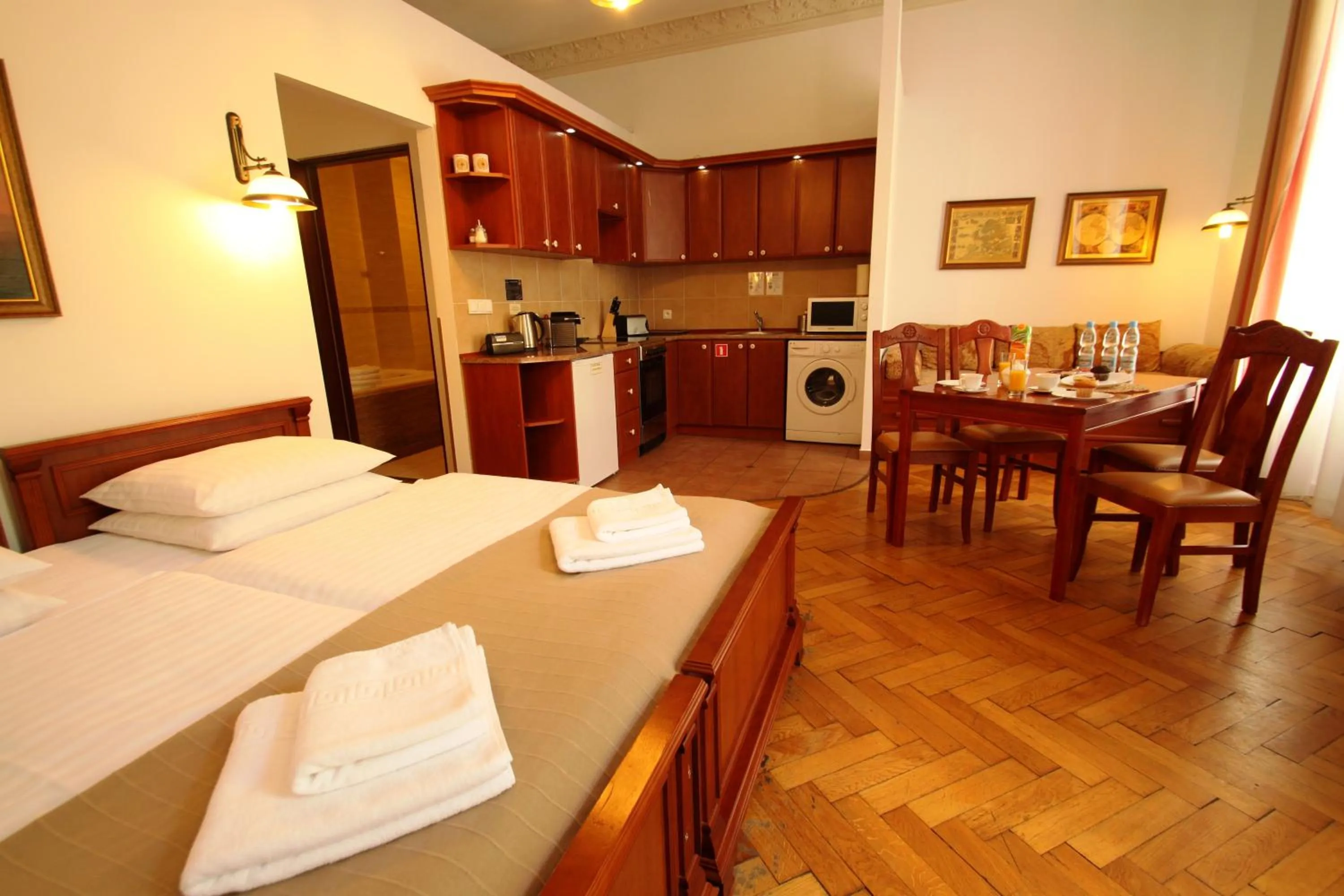 Kitchen or kitchenette, Bed in Ventus Rosa Self Service Apartments